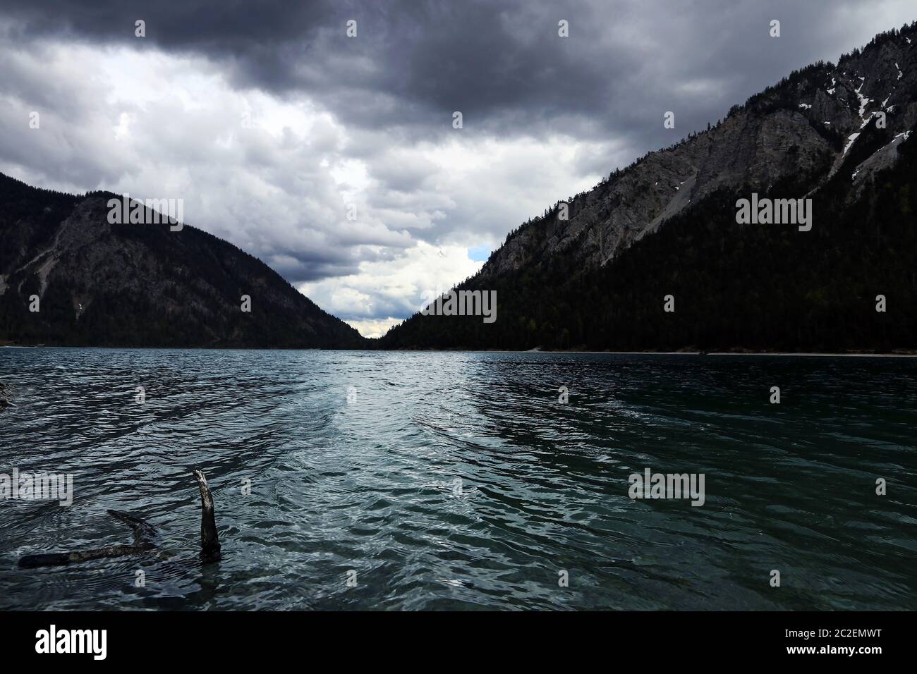 Plansee in Austria during a thunderstorm. Thunderclouds over the Plansee in Austria Stock Photo