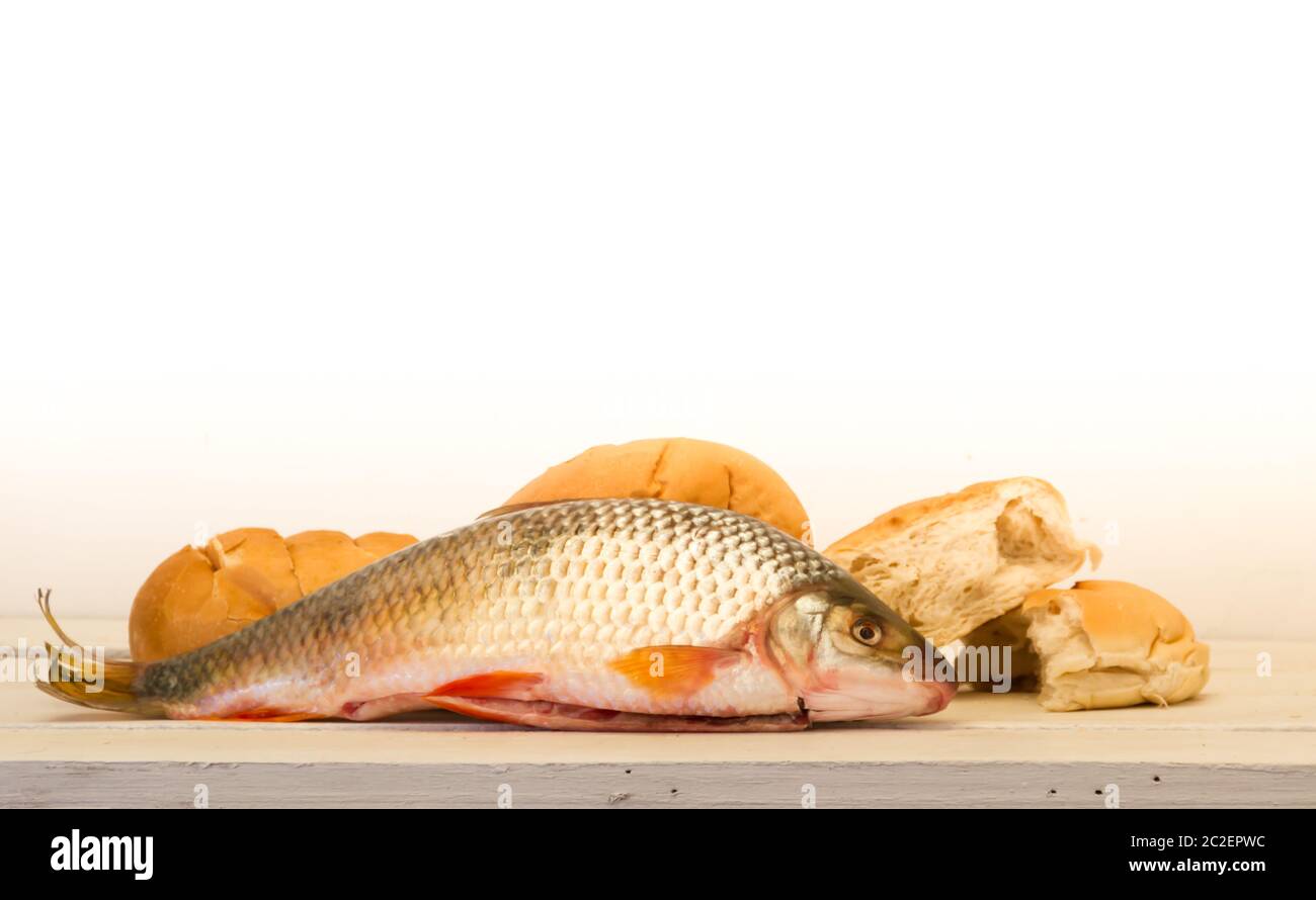 Five loaves of bread and two fish hires stock photography and images