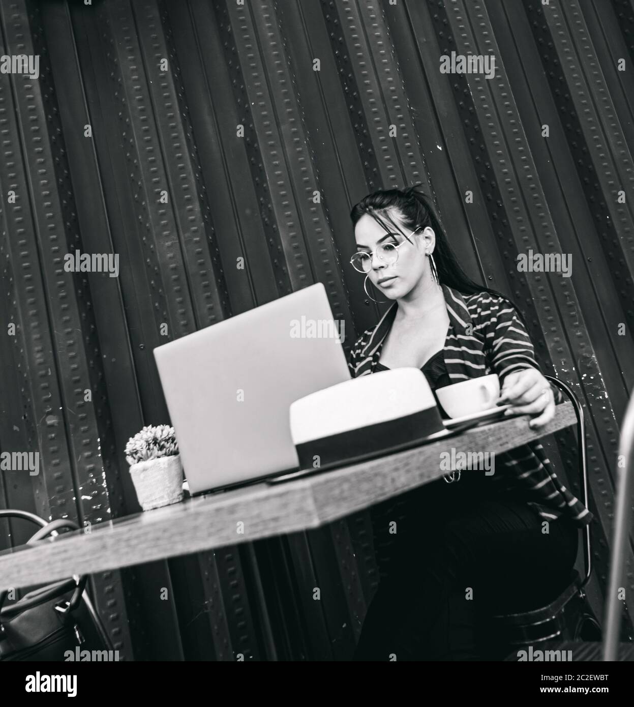 woman working on a bar terrace, entrepreneur Stock Photo