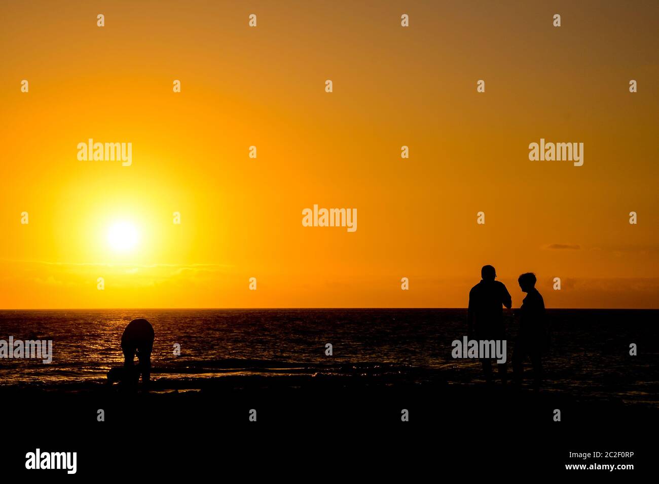 Sea Setting Example Photo Picture of The Sun Setting in the Sea Stock Photo - Alamy