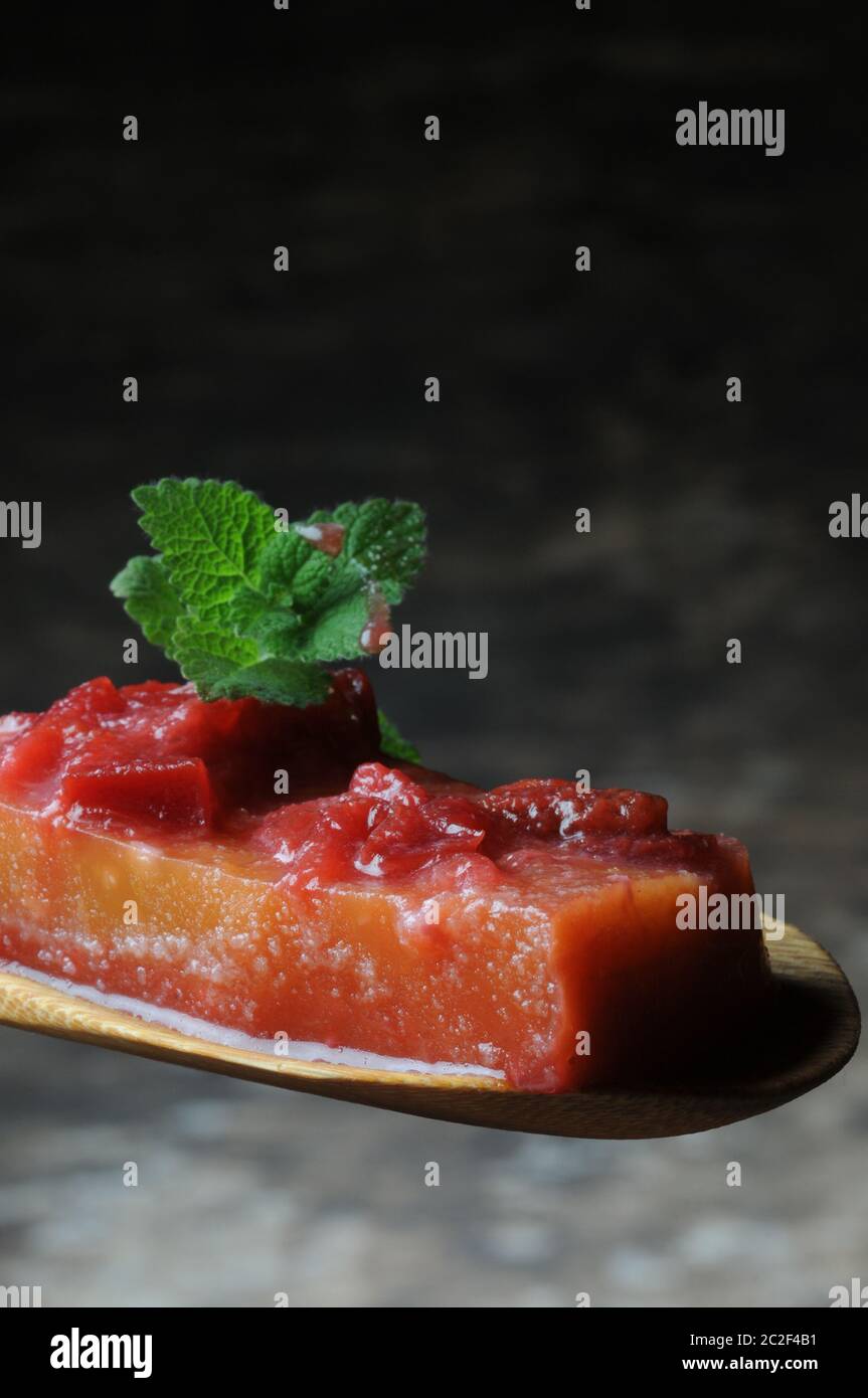 Slice of aspic with peaches Stock Photo