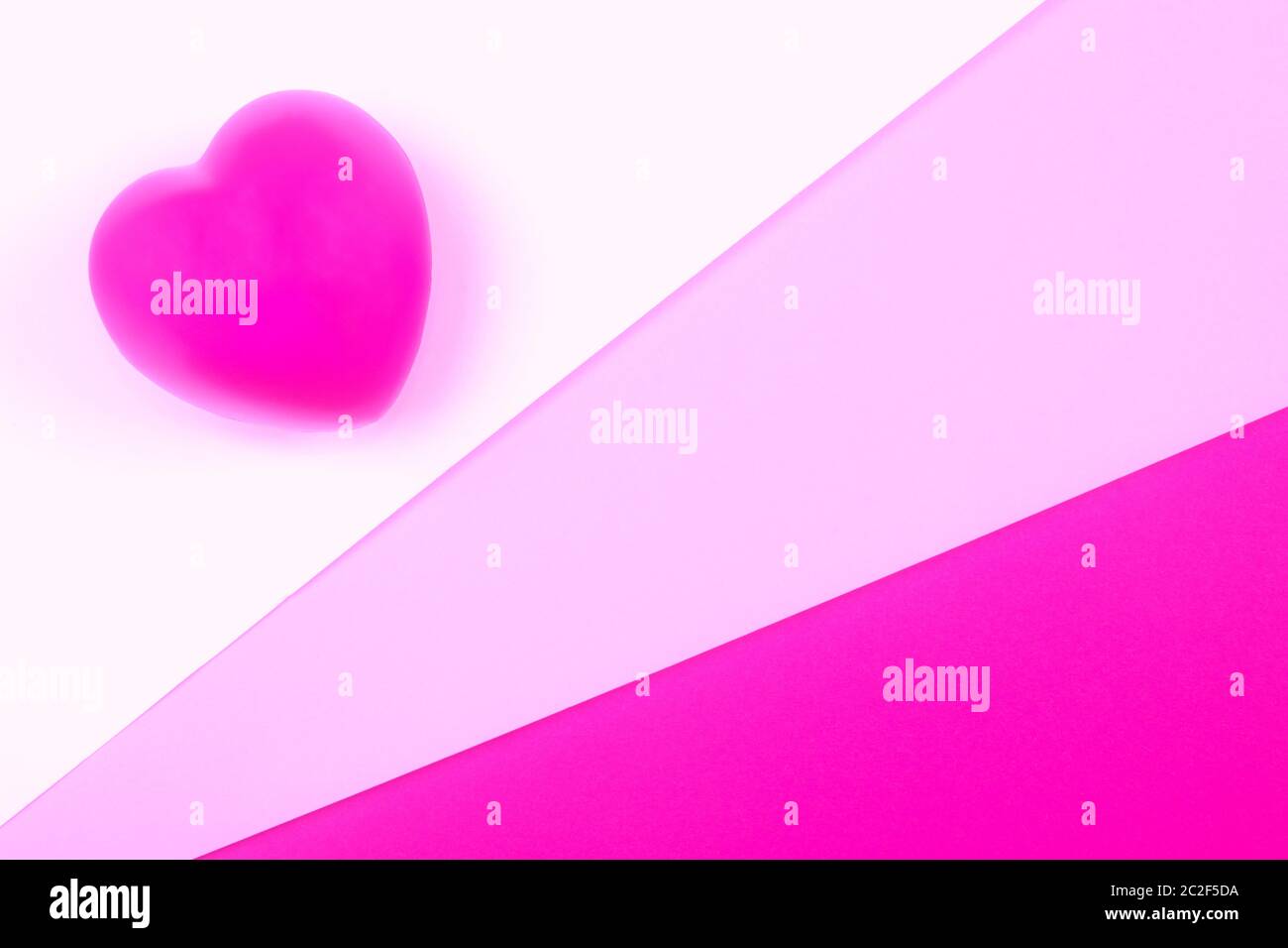 Pink heart on white, pink and purple background, symbol of love for ...