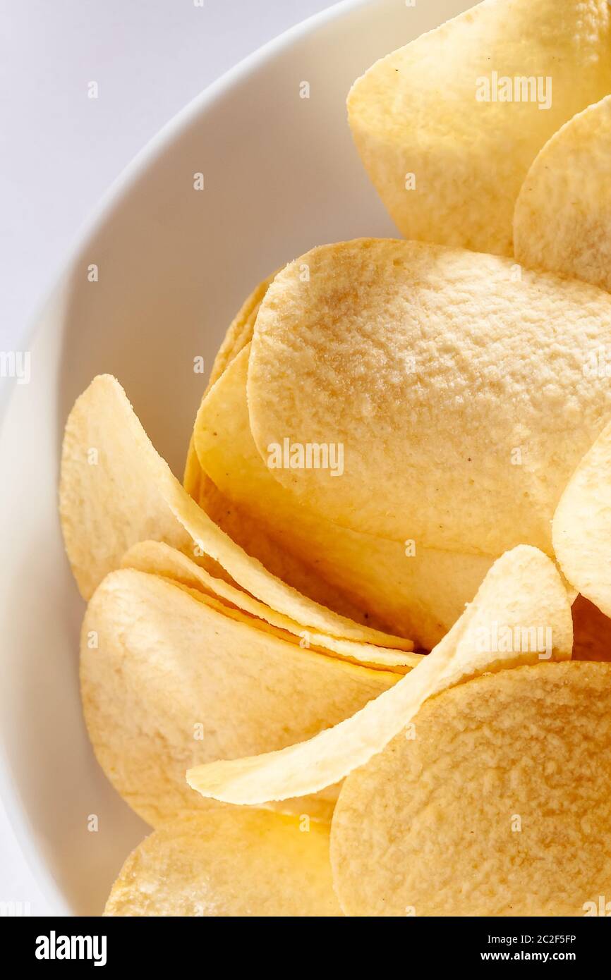 typical crisps in a white bowl Stock Photo Alamy