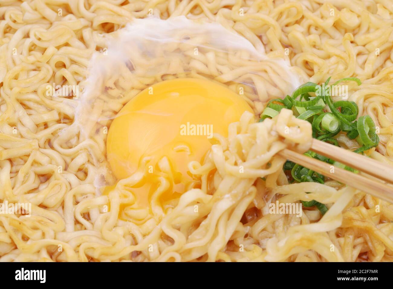 Japanese instant chikin noodles with chopsticks Stock Photo