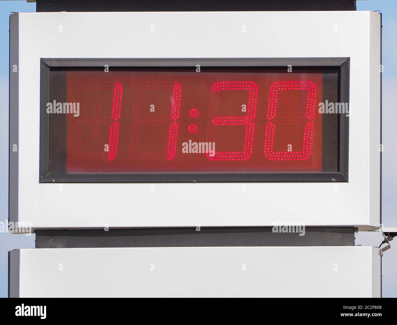 red led display showing time 11:30 (half past eleven) Stock Photo