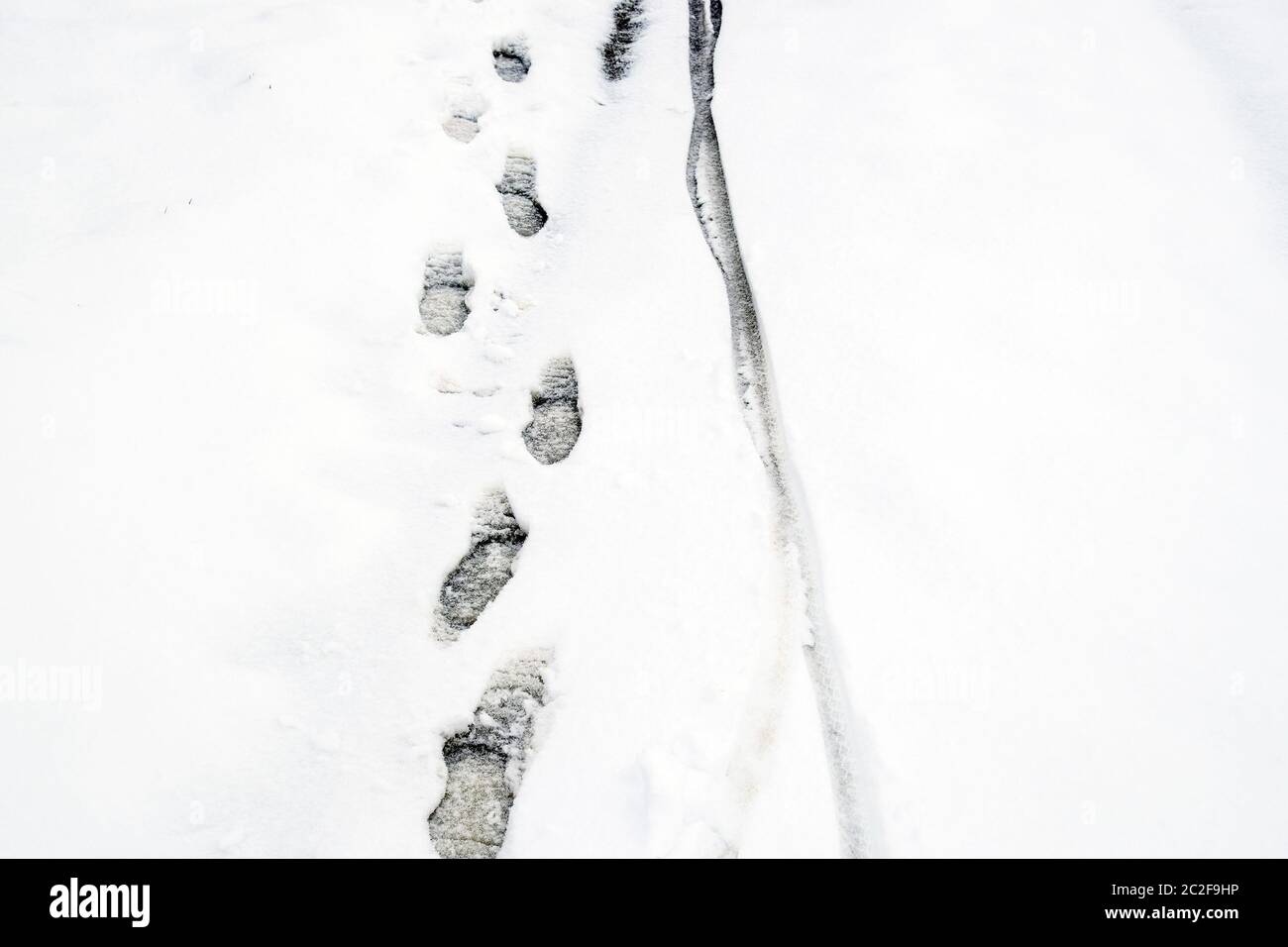 Human footprints in the snow. The path in the snow Stock Photo Alamy