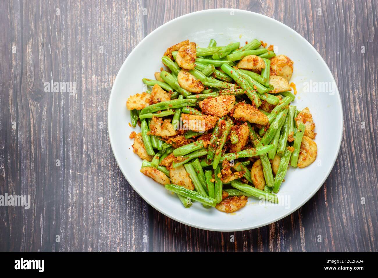 Stir Fried String Green Bean with Vietnamese Grilled Pork Sausage Stock Photo