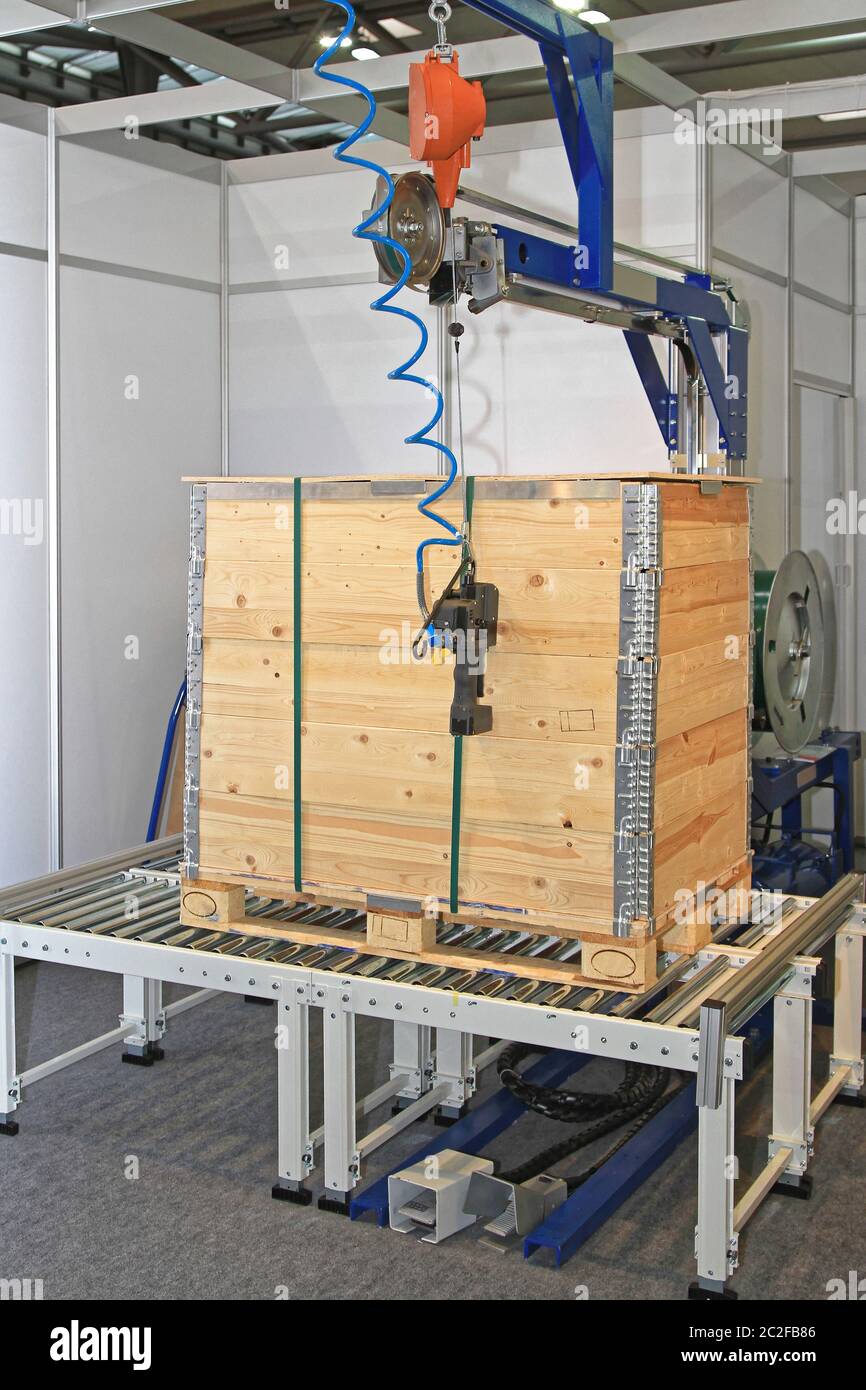Security Straps for Wooden Crate Pallet Packing at Conveyor Stock Photo ...