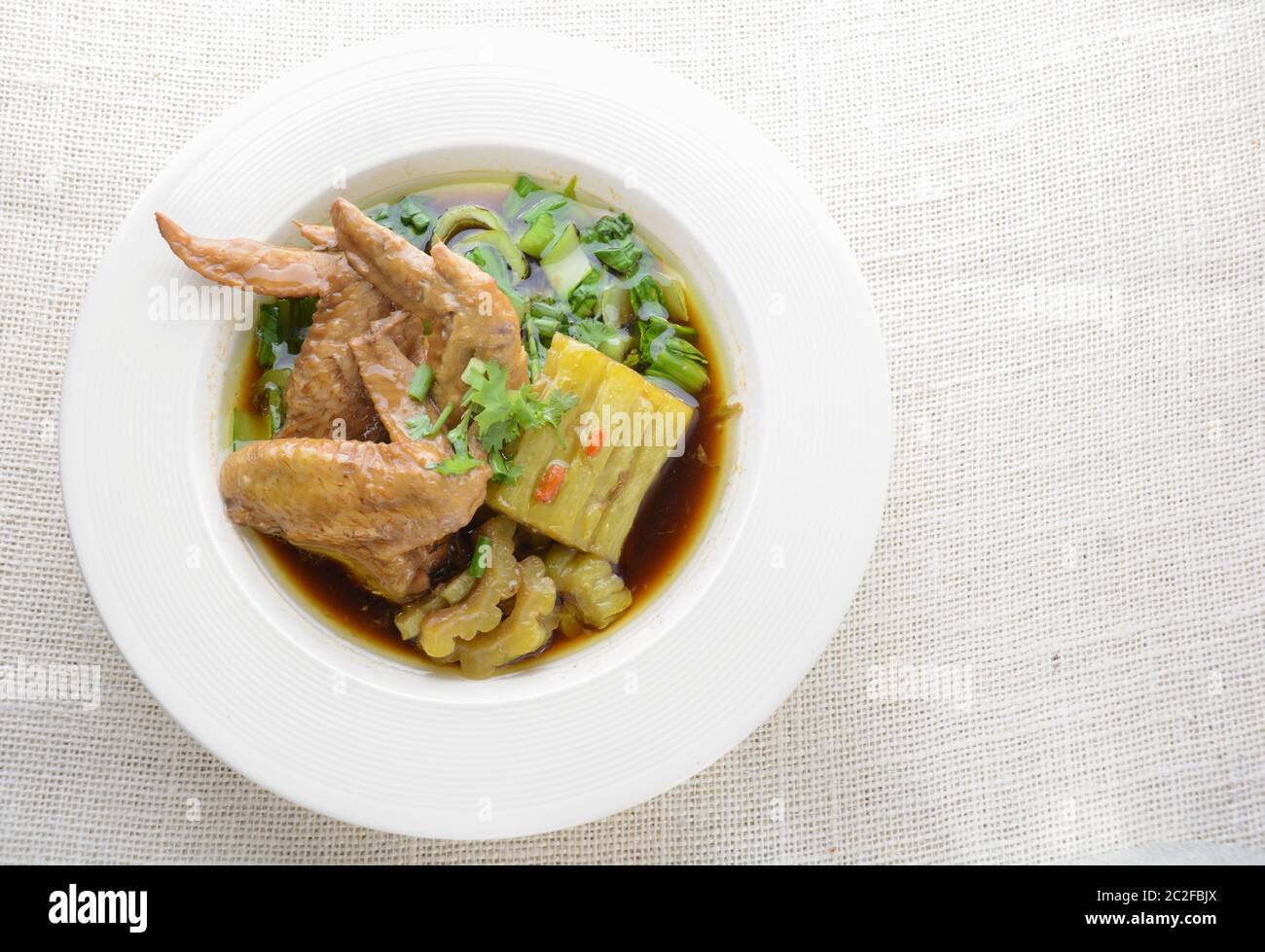 Braised Chicken Wings with Bitter Gourd Stock Photo