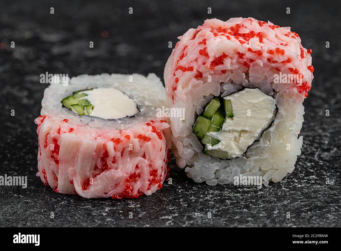 Japanese Food Sushi Rolls California With Cream Cheese And Masago Caviar On Dark Background Stock Photo Alamy