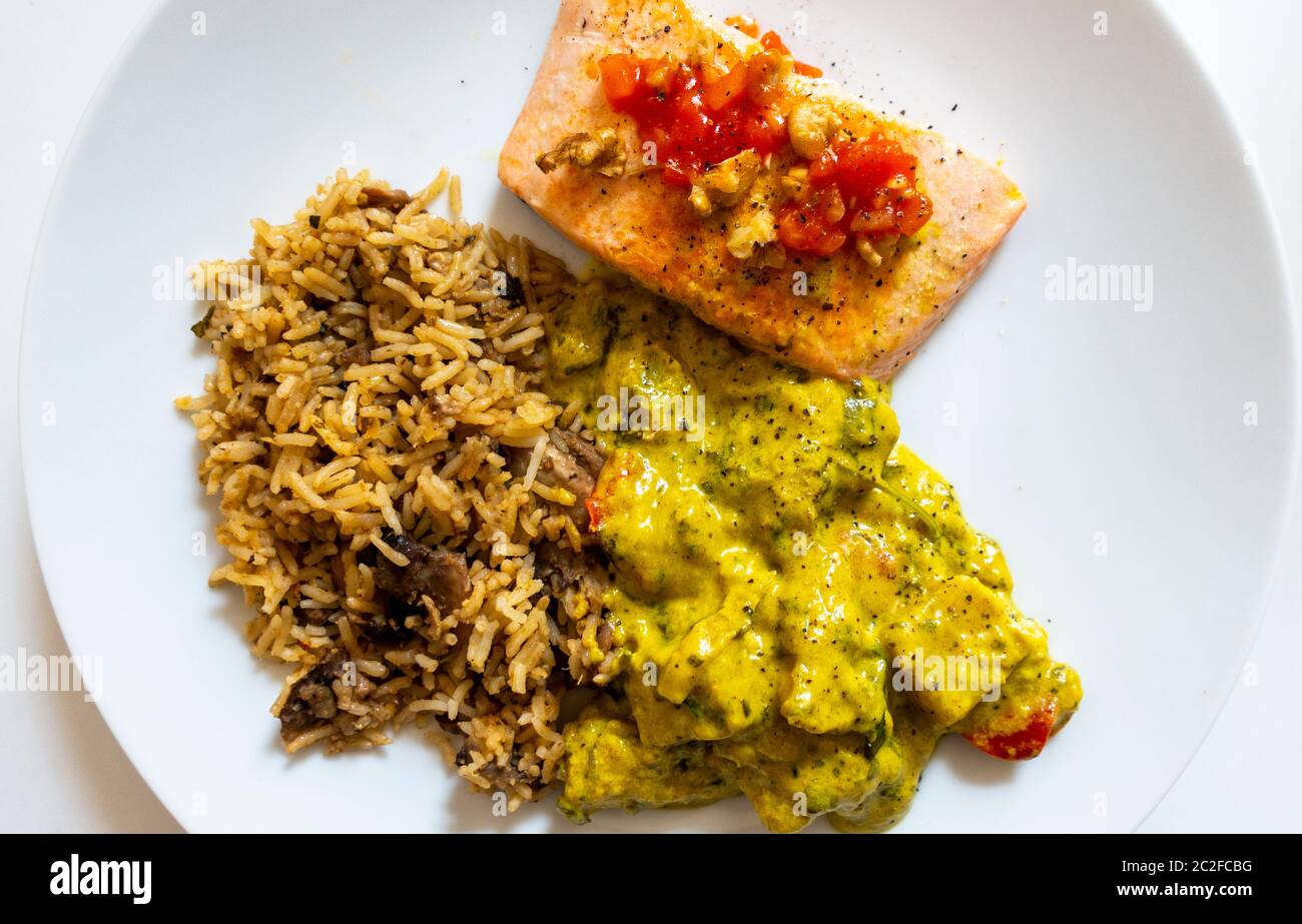 Grilled salmon with mushroom rice and vegetable curry Stock Photo Alamy