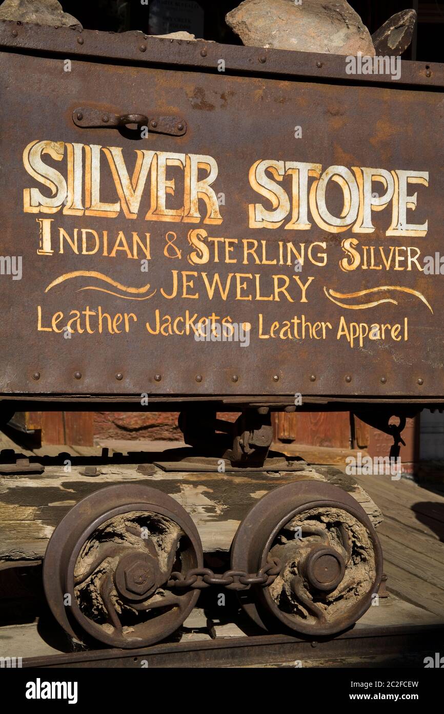 Ore wagon outside Silver Stope Jewelry Store, Virginia City, Nevada, USA Stock Photo