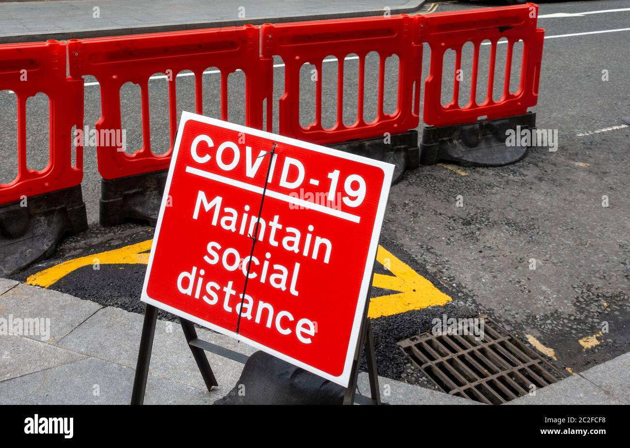 Liverpool warning sign to keep social distancing in public areas Stock