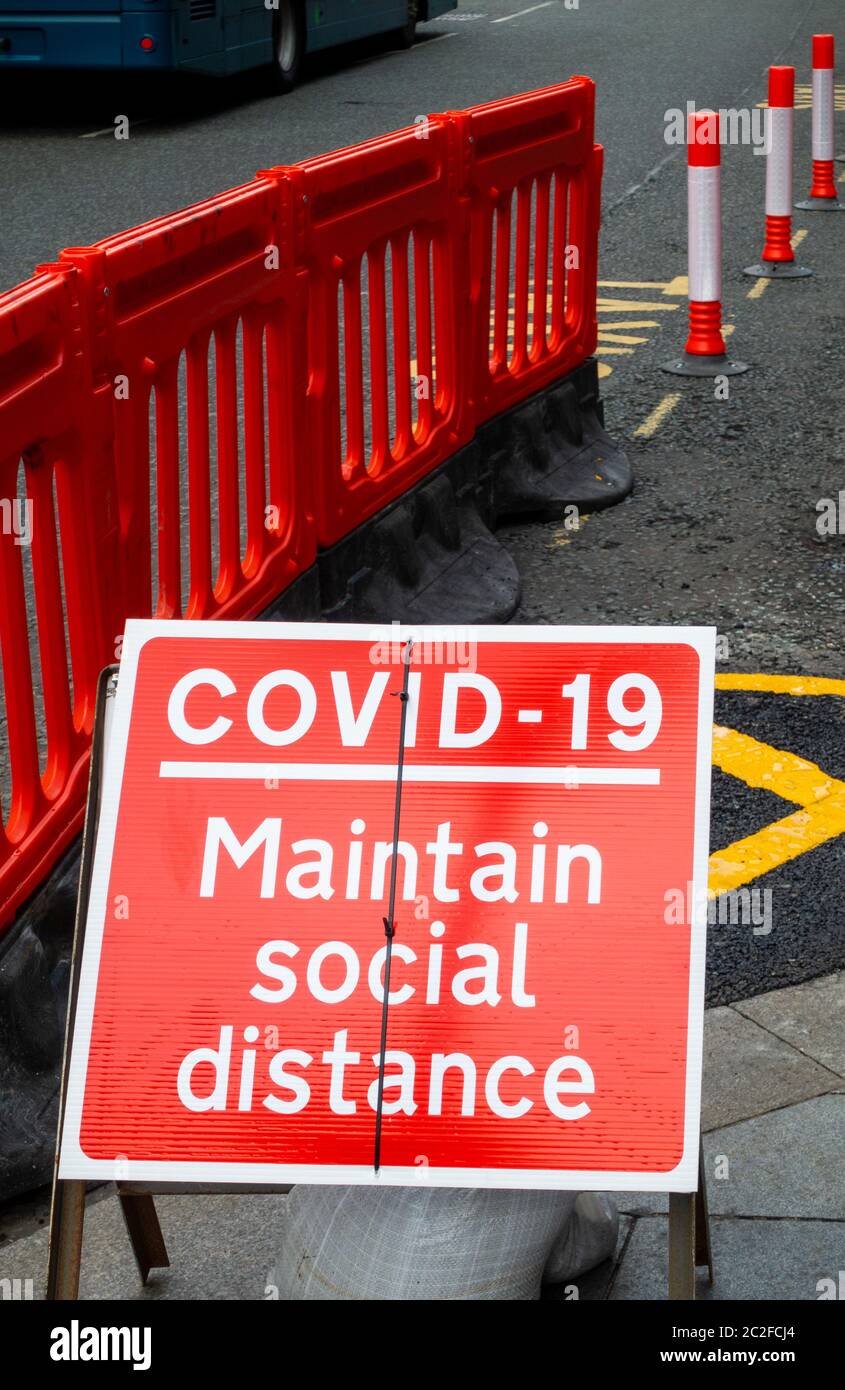 Liverpool warning sign to keep social distancing in public areas Stock