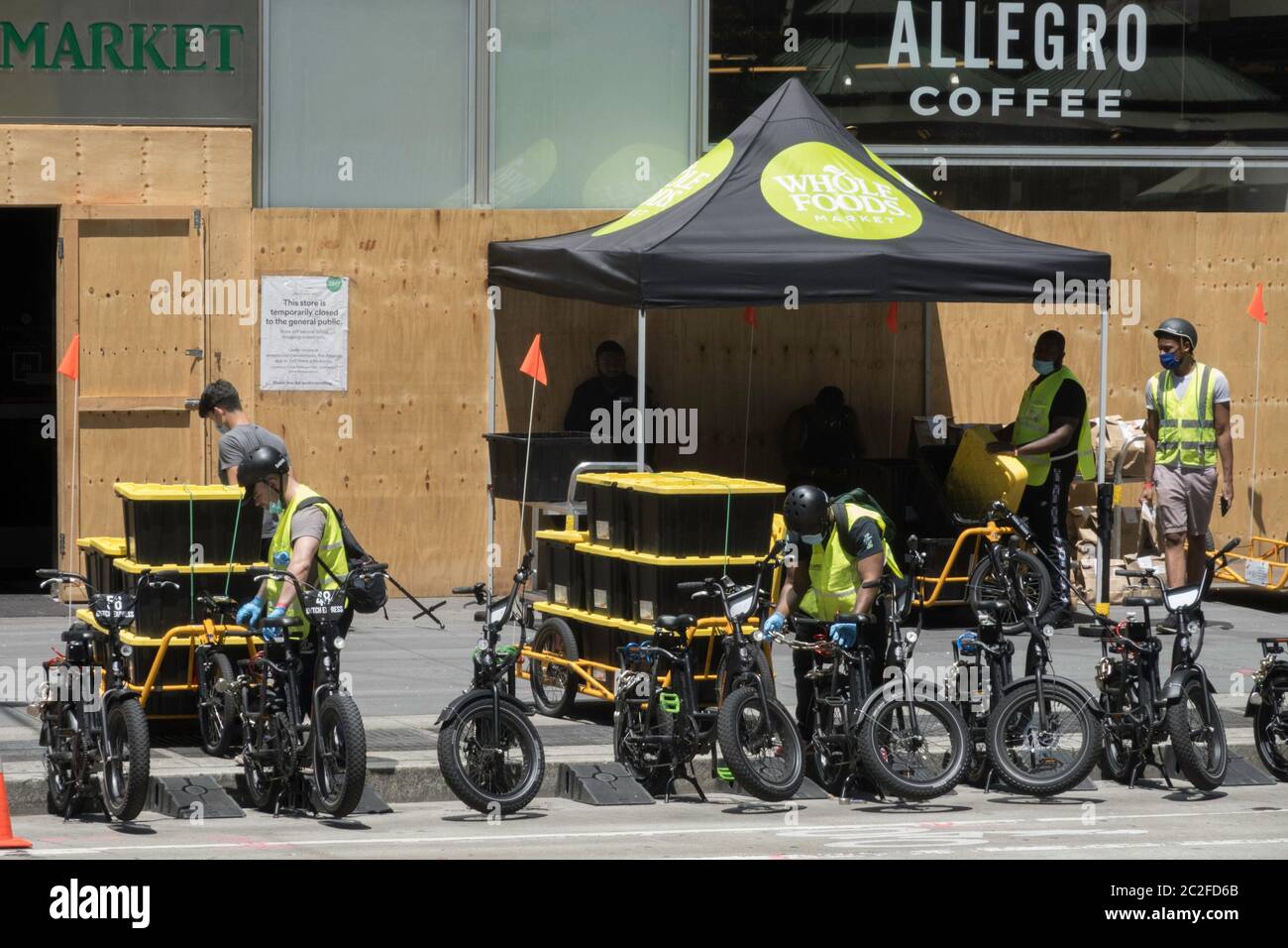 Whole Foods Market employs Carla Cargo trailer with ebike for food delivery in Midtown