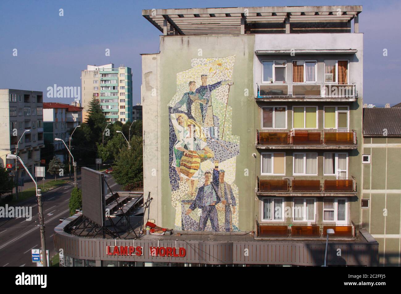Socialist building and socialist realism mural art on building in Baia Mare, Maramures, Romania Stock Photo
