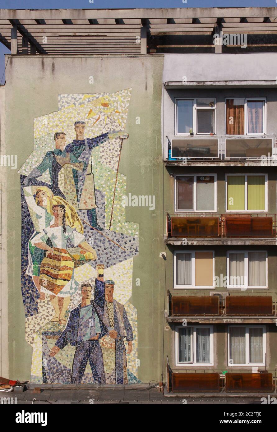Socialist building and socialist realism mural art on building in Baia Mare, Maramures, Romania Stock Photo