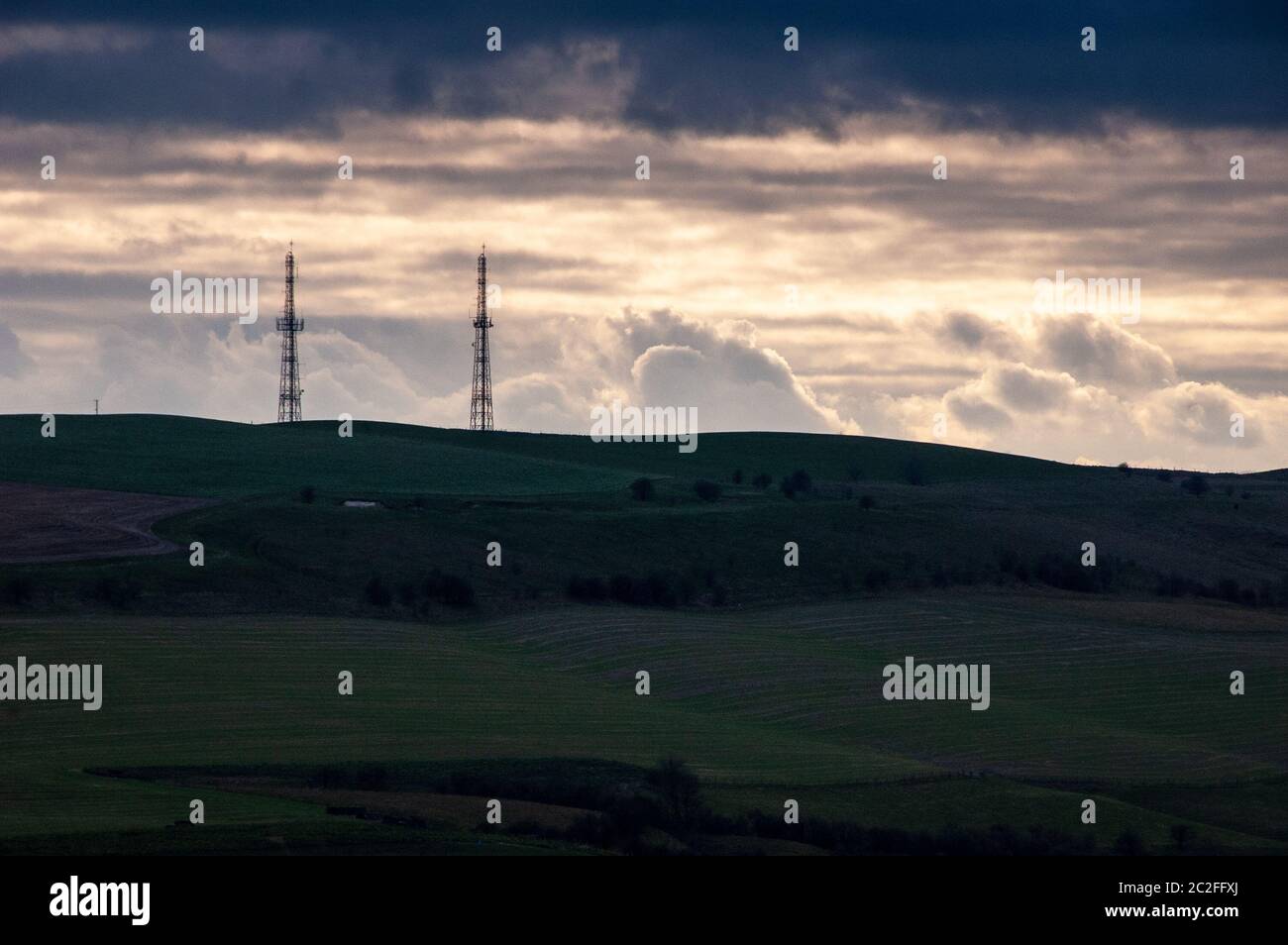 Transmitter masts stand on Morgan's Hill in Wiltshire's North Wessex Downs. Stock Photo
