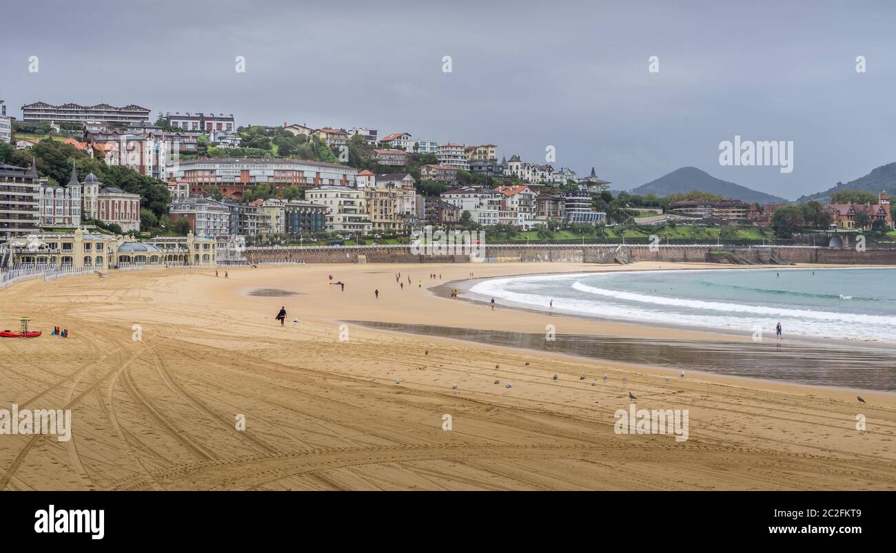 view of La Concha beach in San Sebastian, Spain towards the end of tourist season Stock Photo