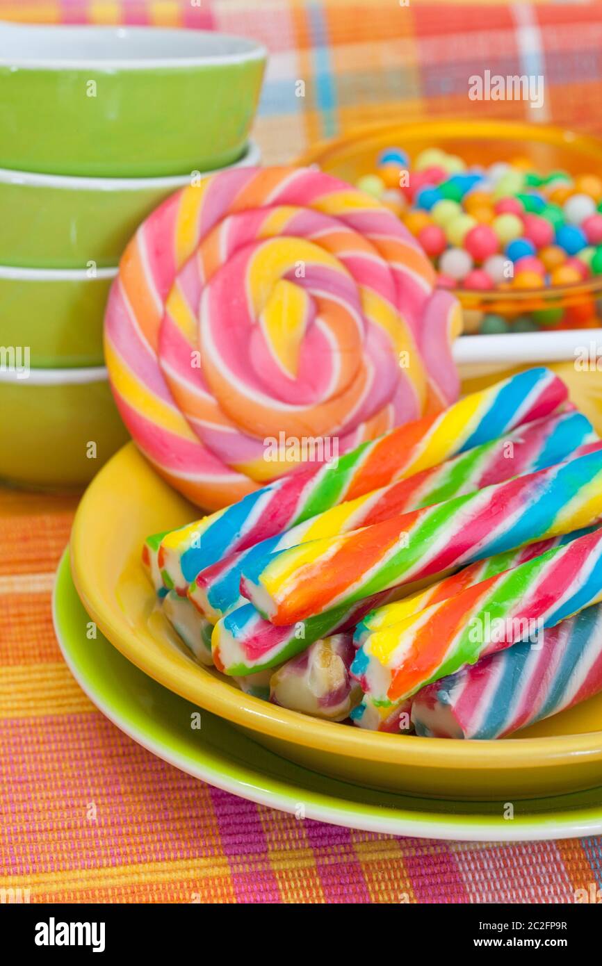 Colorful Sweet Treats Sugar Canes And Candies On A Textile Background Stock Photo Alamy