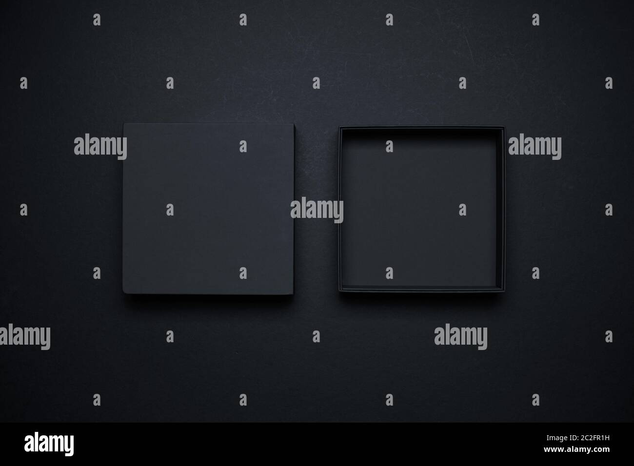 Black Boxes mockup  opened and closed display on black background Stock Photo