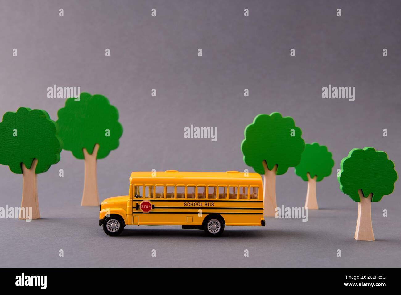 Art design picture of school bus taking kids from home to primary ...