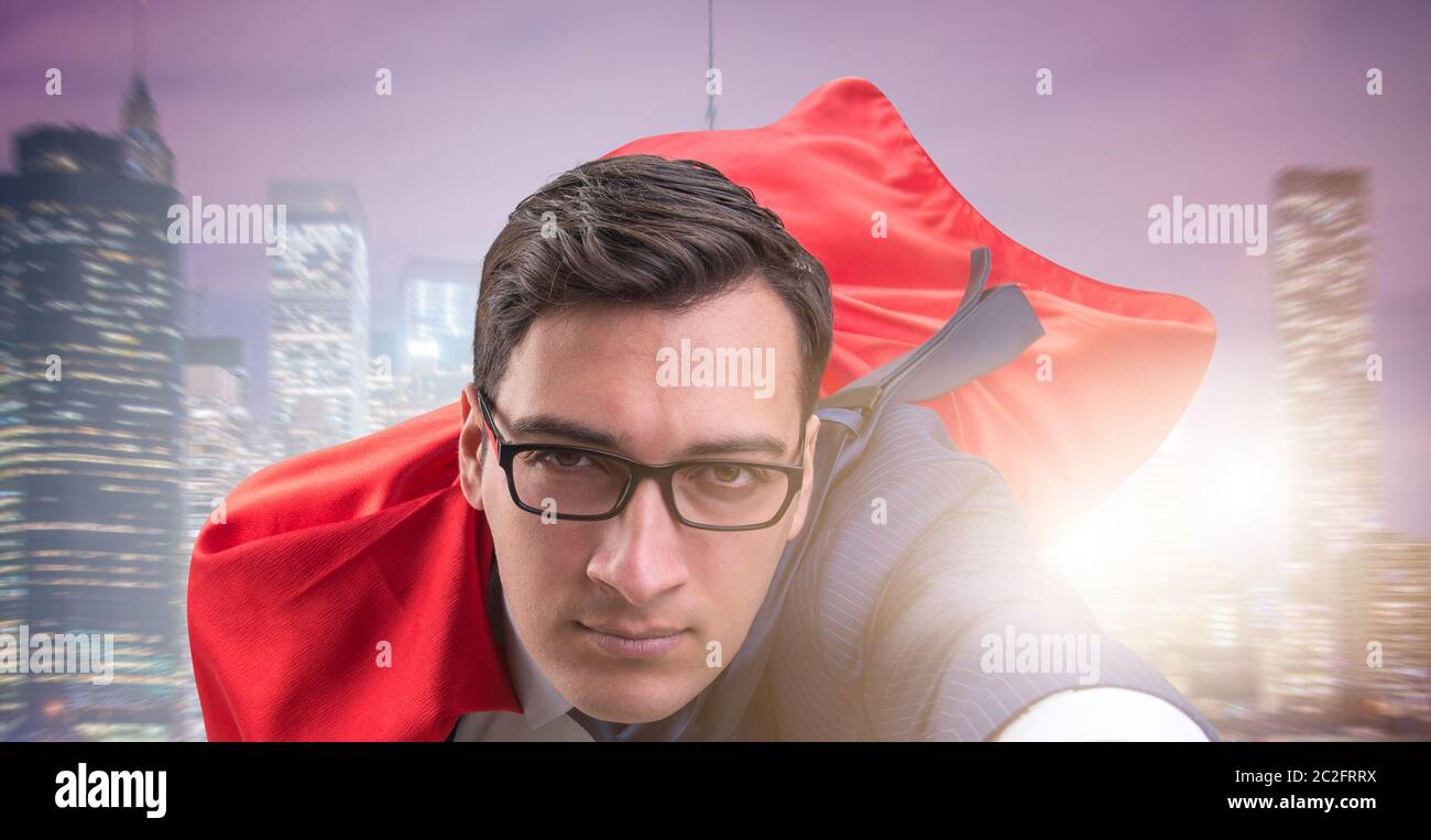 Flying super hero over the city Stock Photo