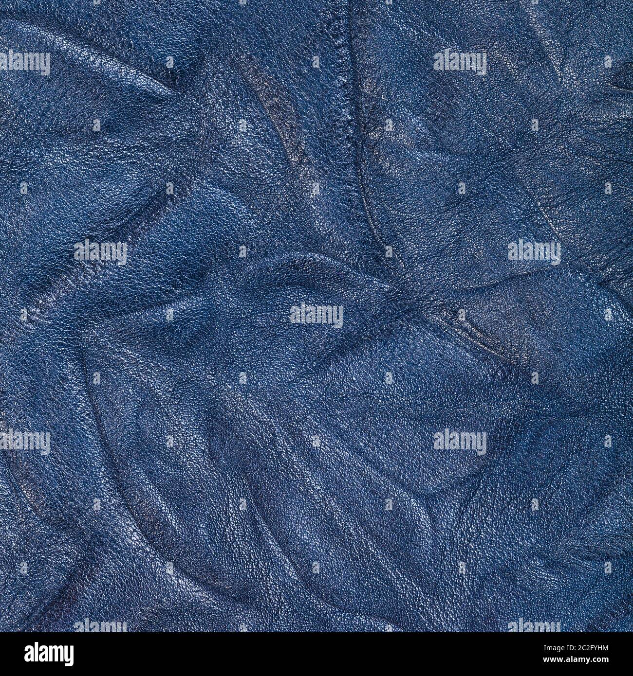 textured square background from blue crumpled leather close up Stock Photo