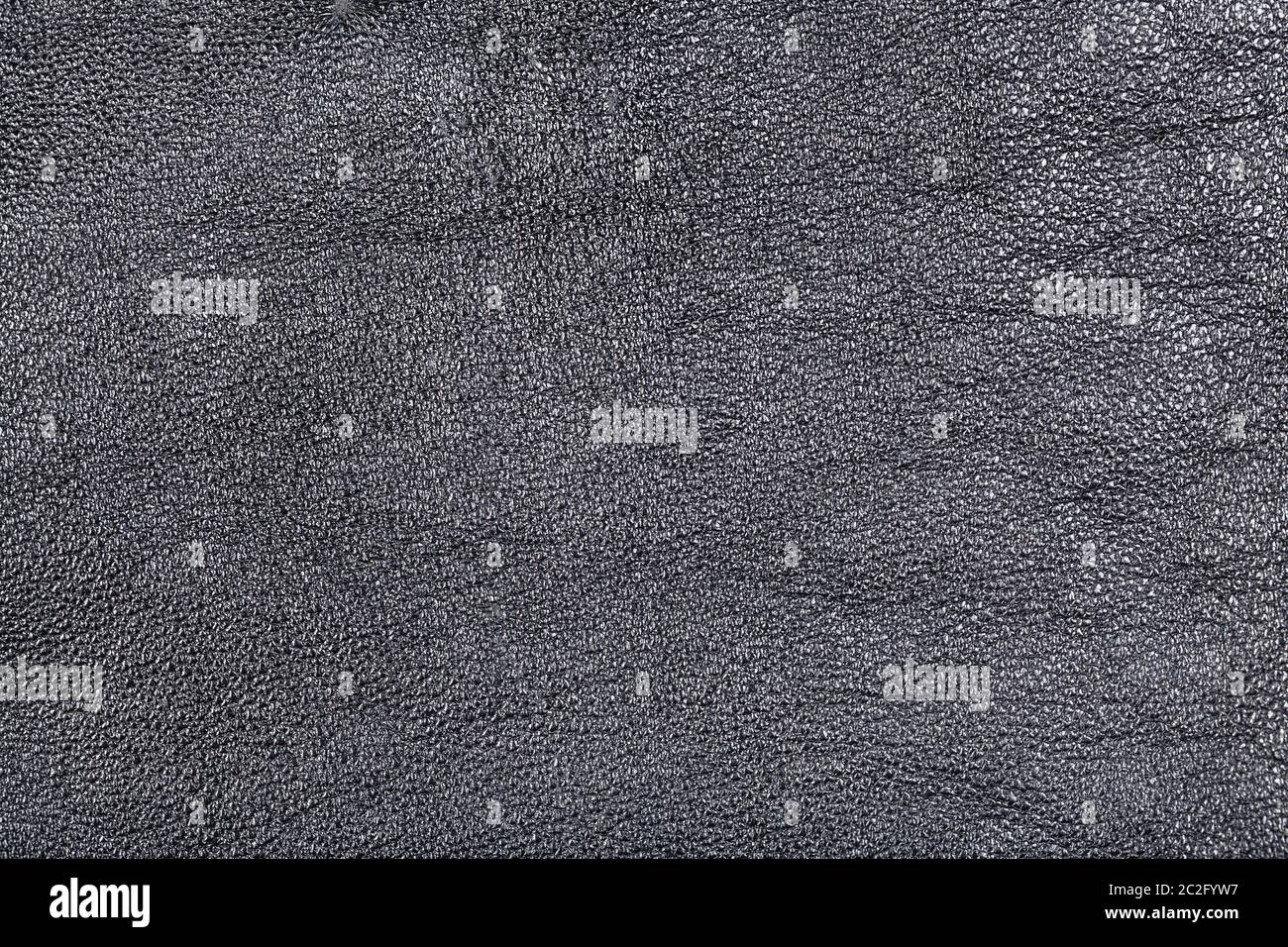 textured background from black leather close up Stock Photo