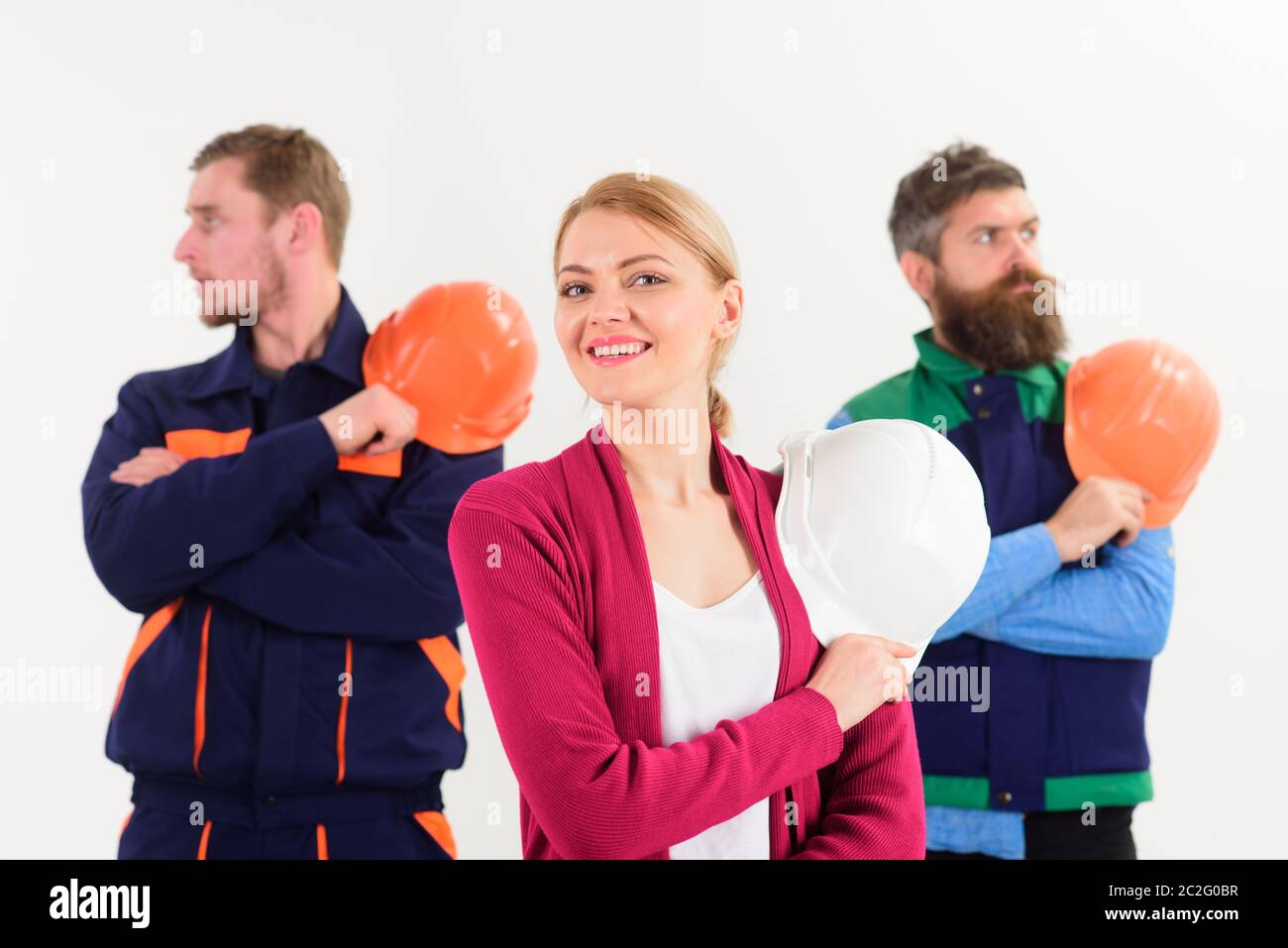Team of architects, builders ready to work, isolated white background ...