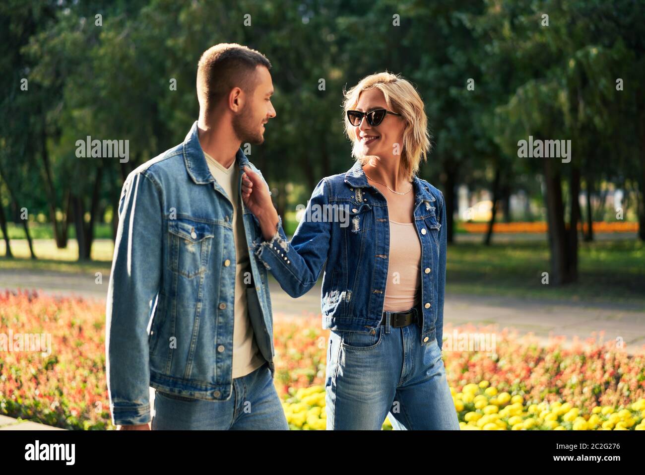 Young couple in love walking outdoors Stock Photo