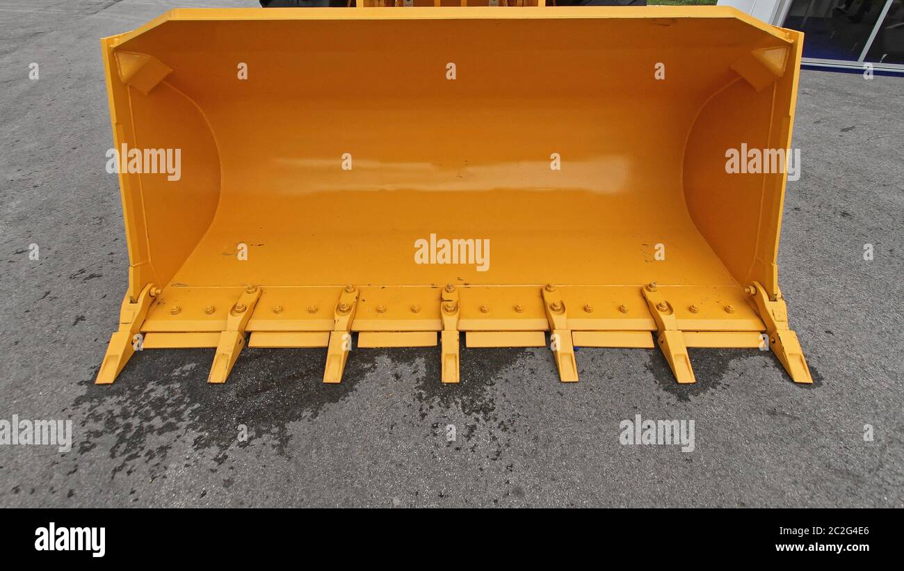 Big Yellow Bucket Scoop at Front Loader Construction Machine Stock