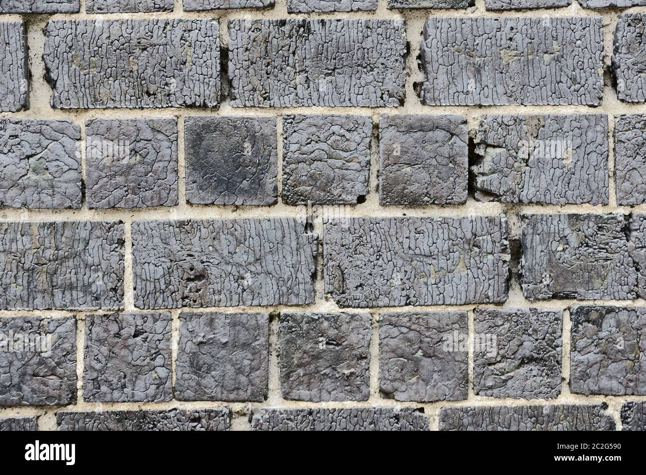 brick wall with cracked surface Stock Photo