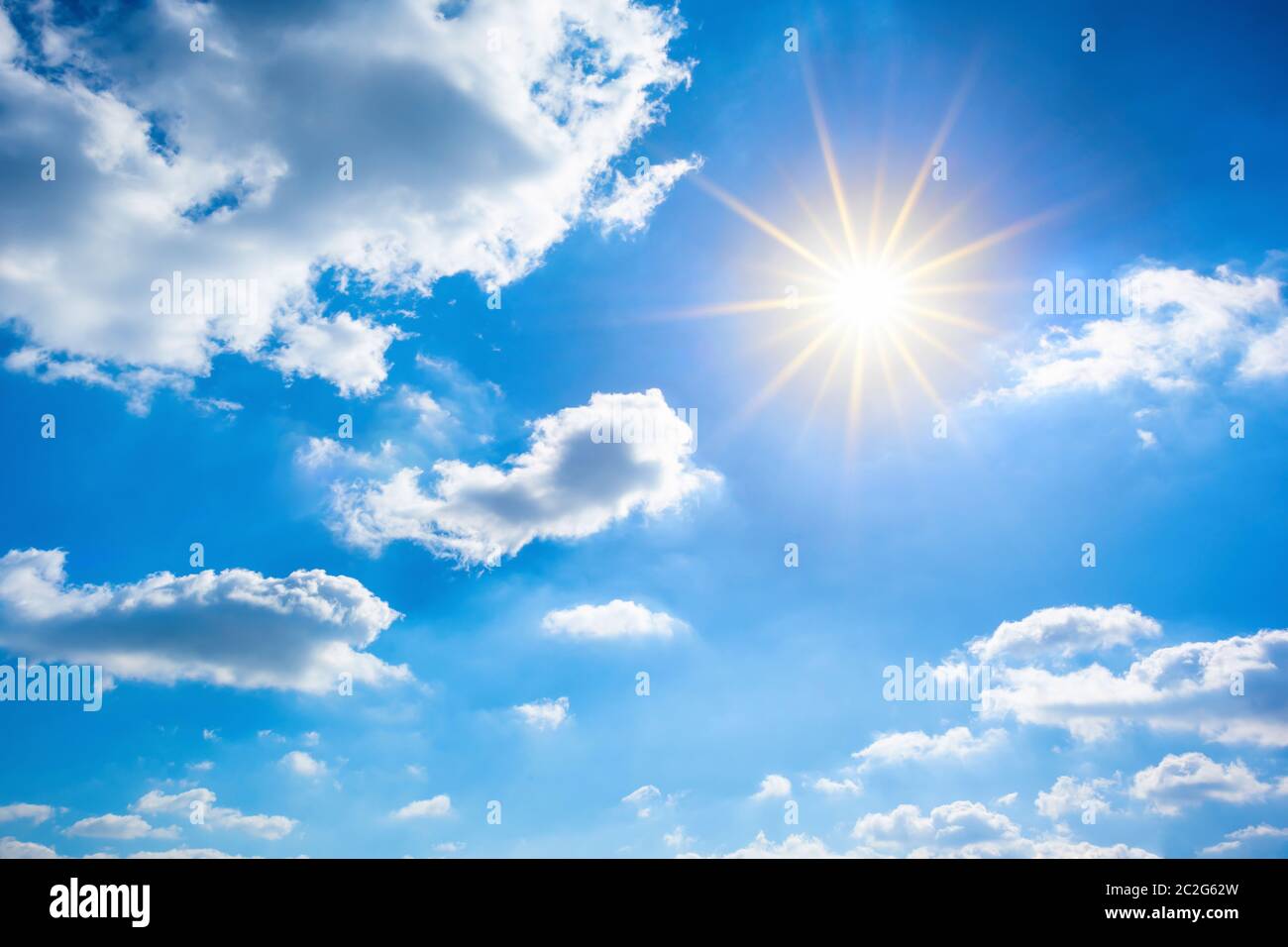 Sunny background, blue sky with white clouds and bright sun Stock Photo ...