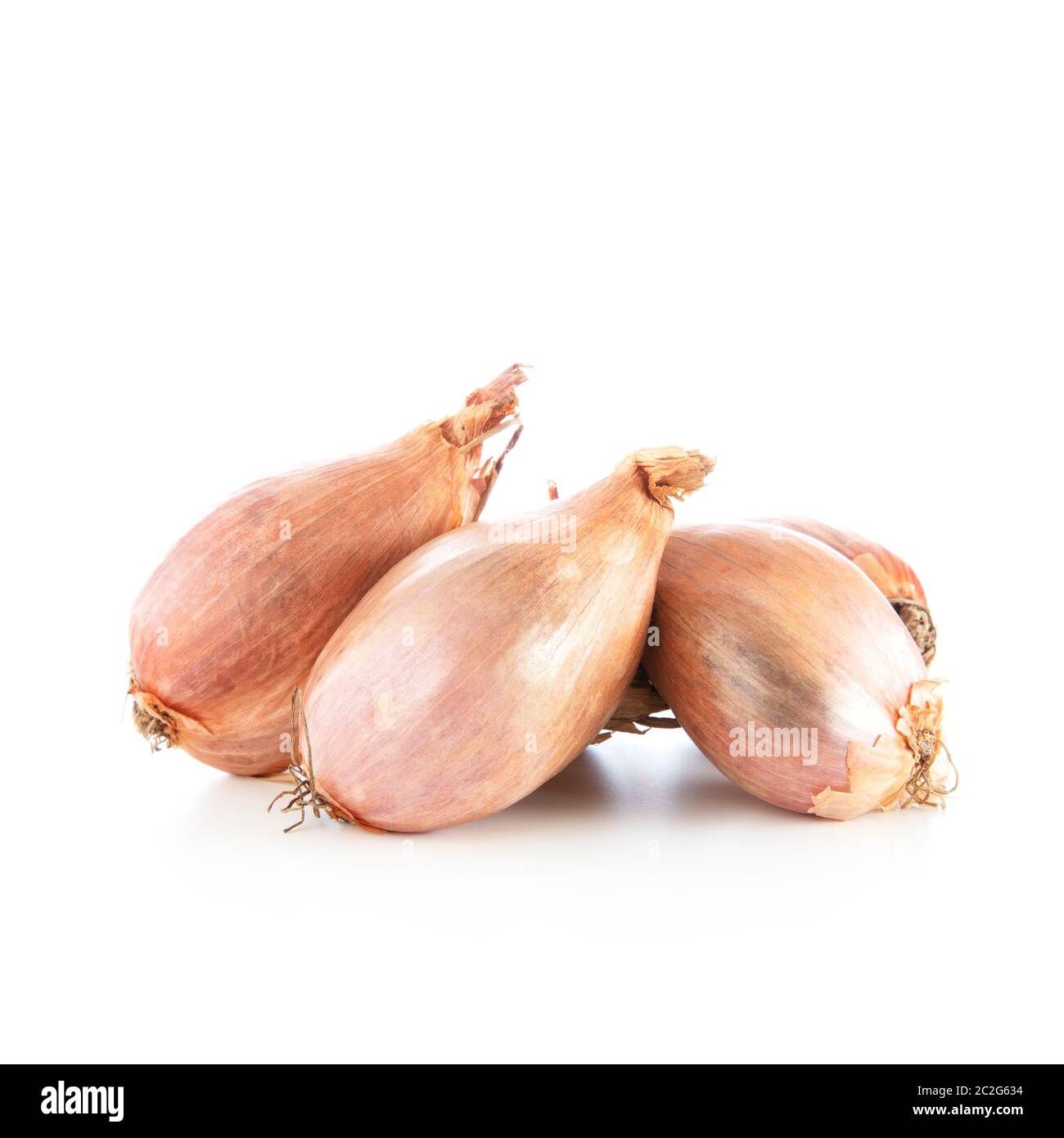 Whole shallots isolated on a white background, with shadow Stock Photo