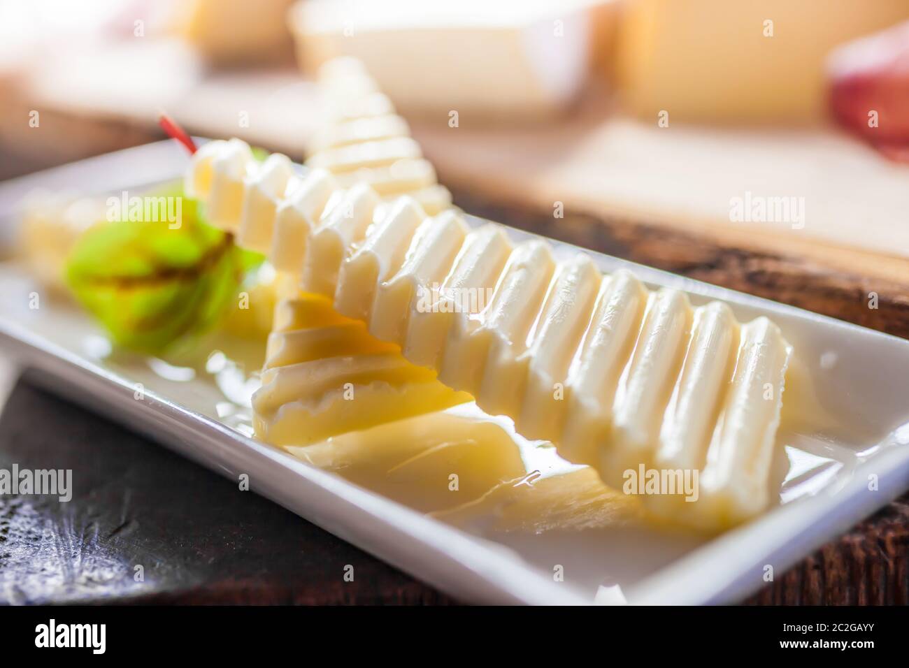 Sliced butter in a guest room on an alpine hut in South Tyrol, Italy Stock Photo