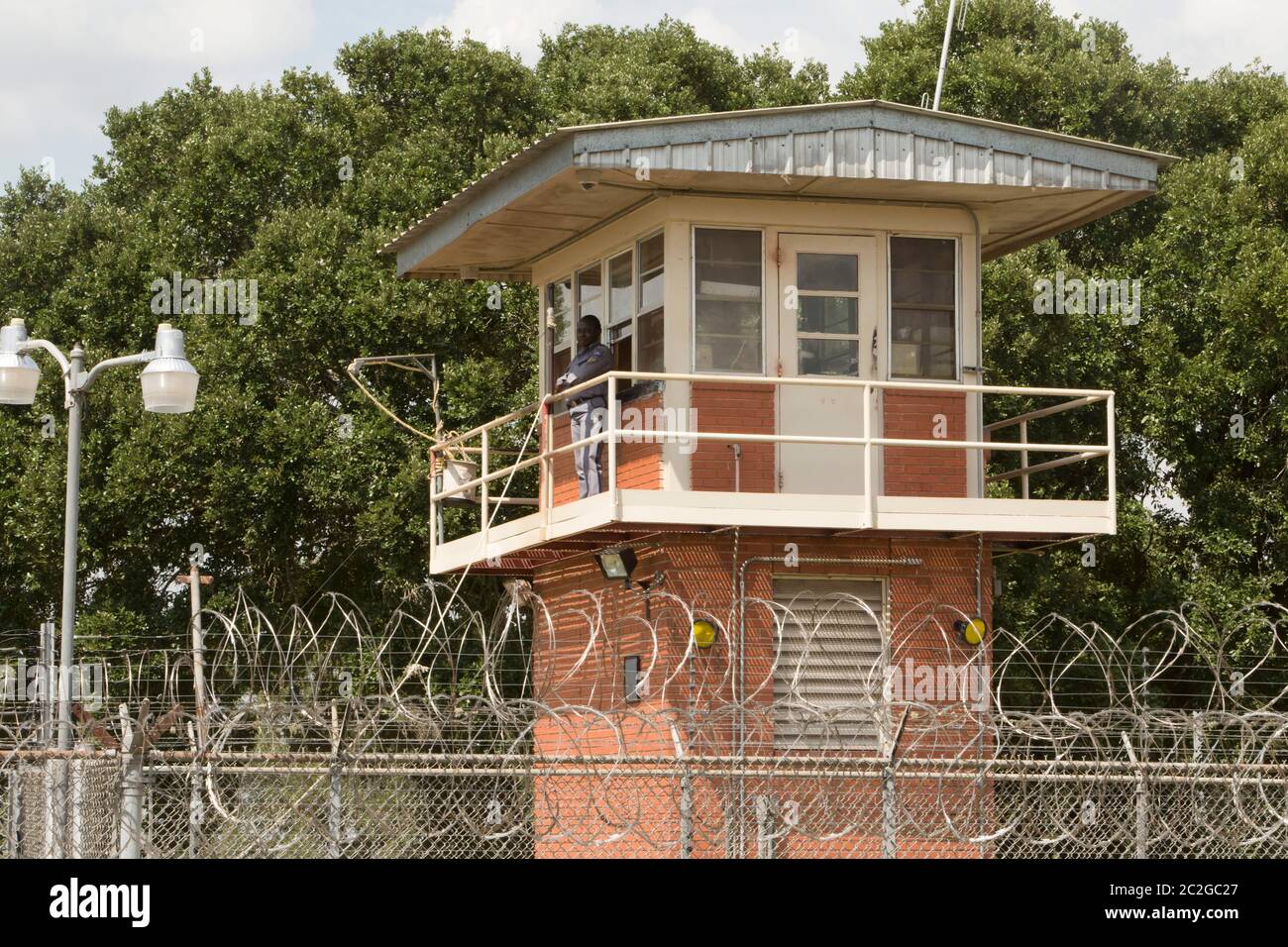 Guard tower on the grounds of the maximum-security Darrington Unit men's prison, part of the Texas Department of Criminal Justice. The unit is located in Brazoria County in Southeast Texas. ©Bob Daemmrich Stock Photo