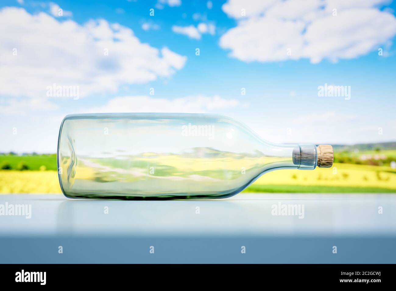 lying glass bottle landscape scenery background Stock Photo - Alamy
