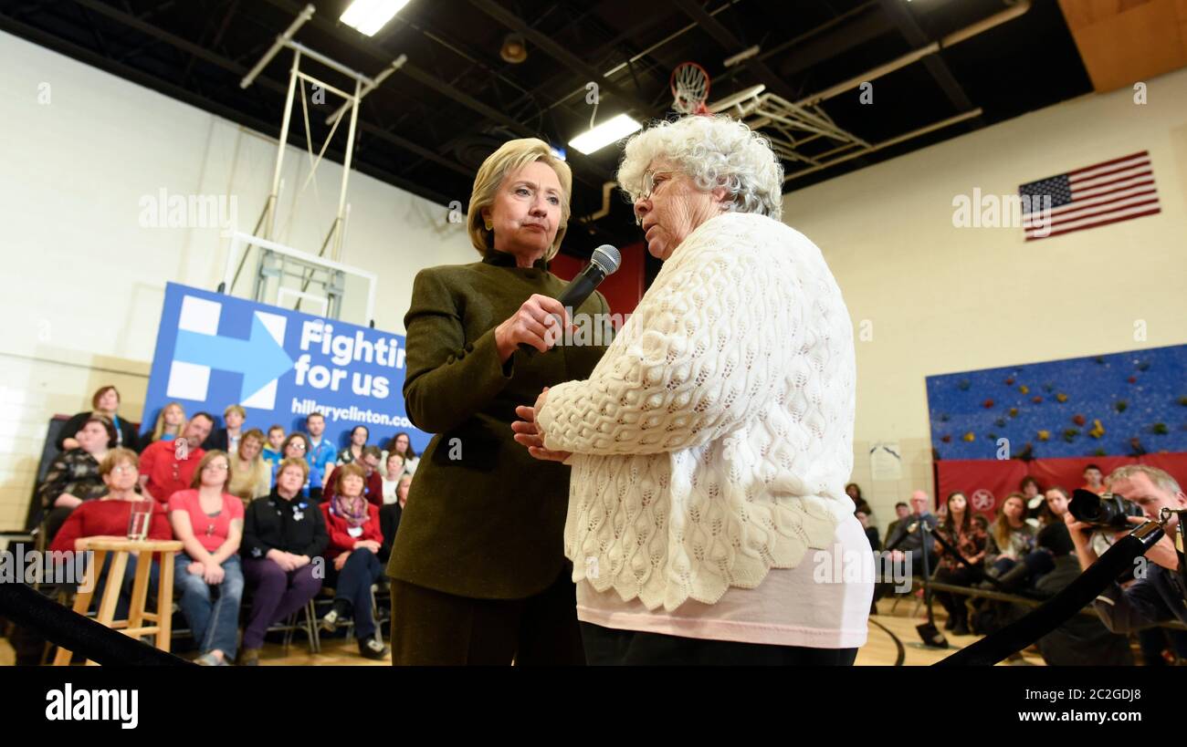 Newton Iowa USA, January 28, 2016: Democratic frontrunner Hillary Clinton, former U.S. senator and first lady, takes her campaign to Newton, Iowa about an hour outside Des Moines, and holds the microphone as an audience member asks a question.  ©Bob Daemmrich Stock Photo