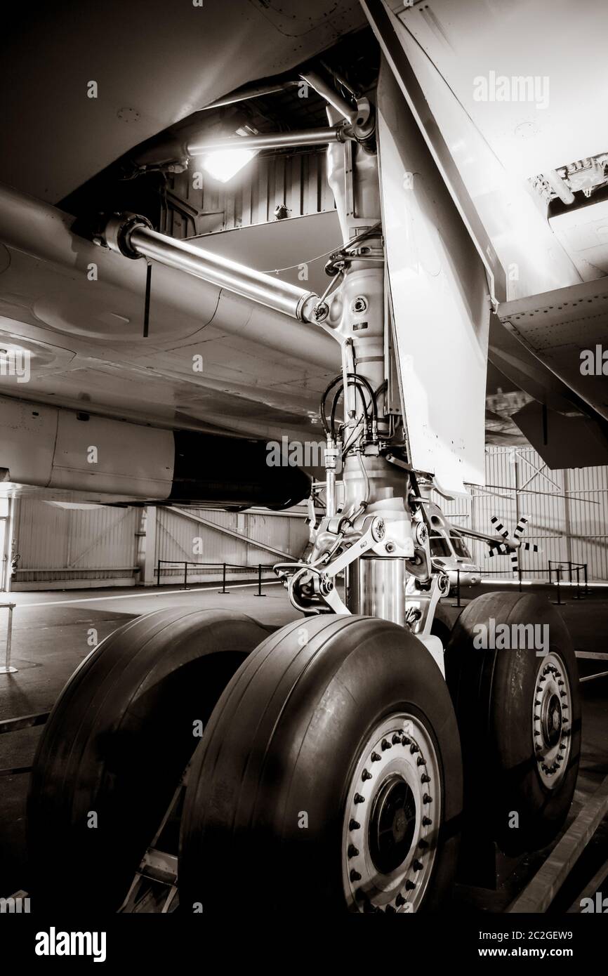 Commercial airplane landing gear detail. Black and white Stock Photo ...