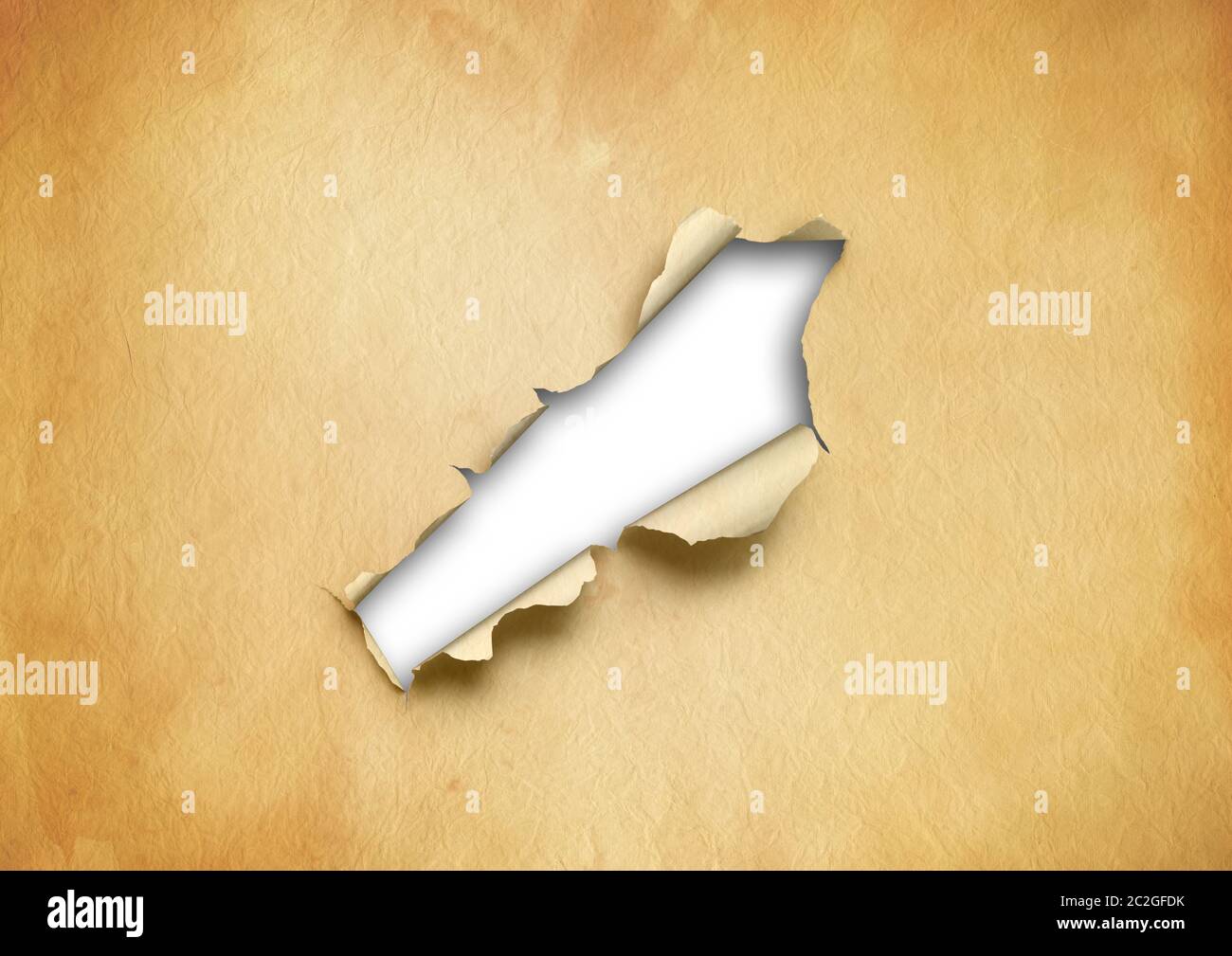 Old torn parchment paper with hole. blank background template Stock