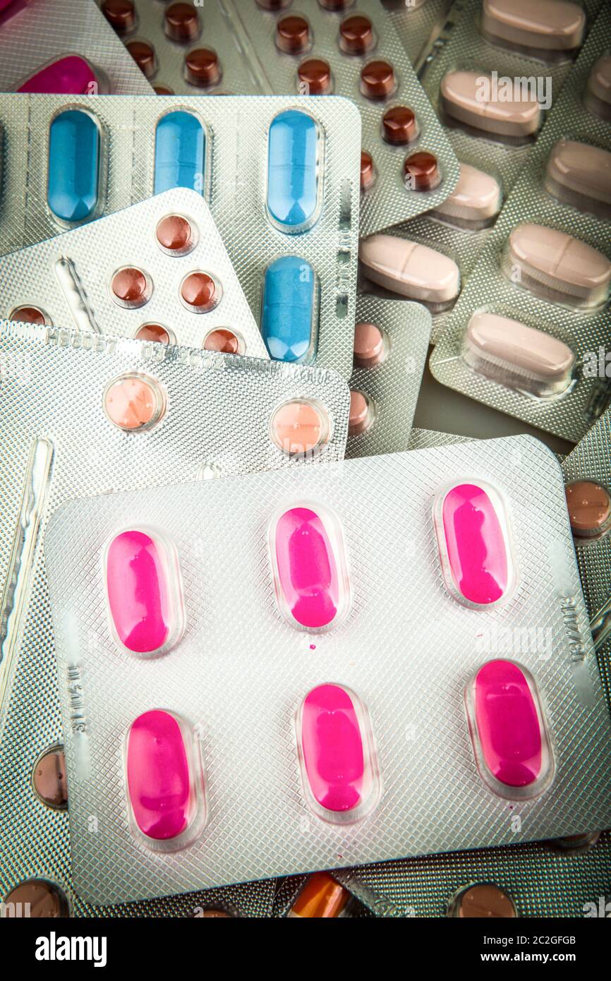 Top view of large amount of pills Stock Photo - Alamy