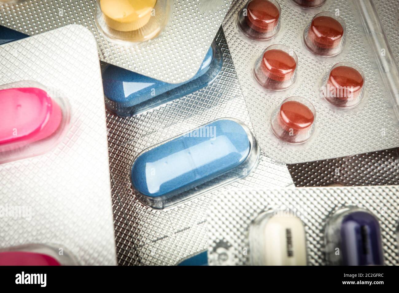 Top view of large amount of pills Stock Photo - Alamy