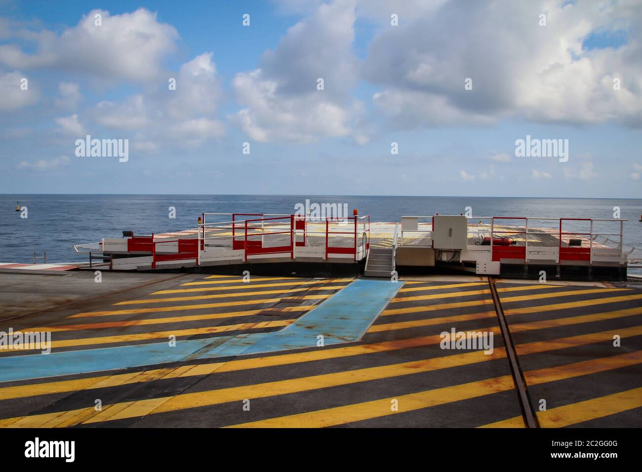 A helicopter landing pad by the sea Stock Photo