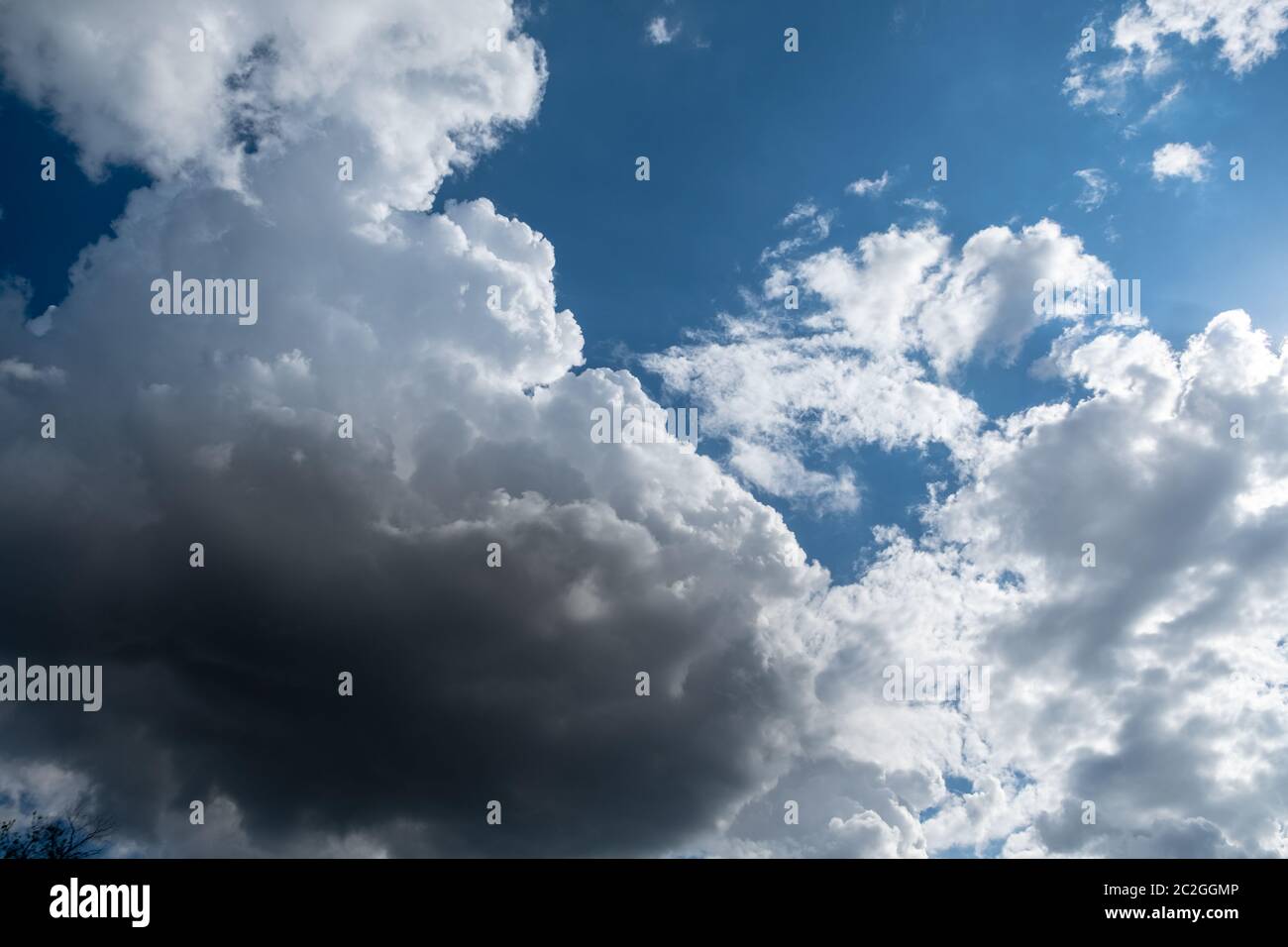 blue dark clouds on the blue sky Stock Photo - Alamy