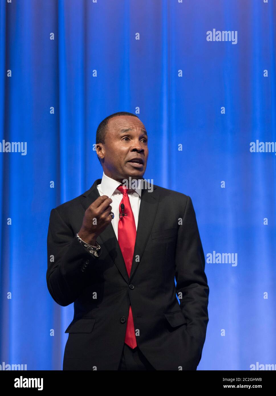 Houston Texas USA, April 14, 2016: Legendary boxer Sugar Ray Leonard, who won world titles in five different weight divisions, delivers a motivational and inspirational message at a business convention.  ©Bob Daemmrich Stock Photo
