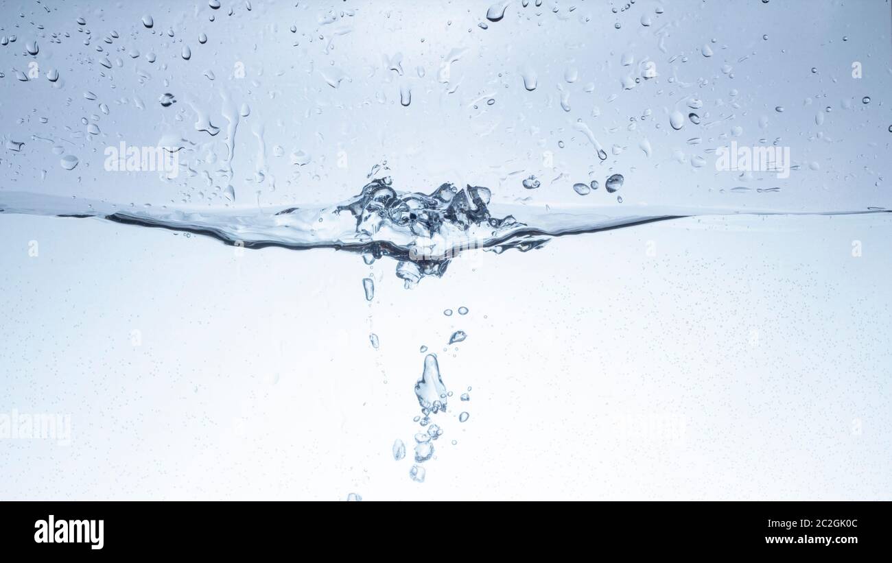 Water splash isolated on white. Close up of splash Stock Photo - Alamy