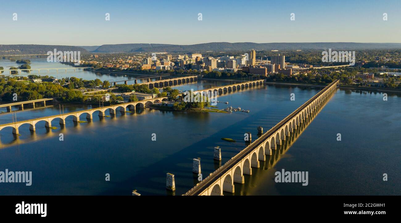 Morning light hits the buildings and bridges downtown city center area in Pennsylvania state capital at Harrisburg Stock Photo