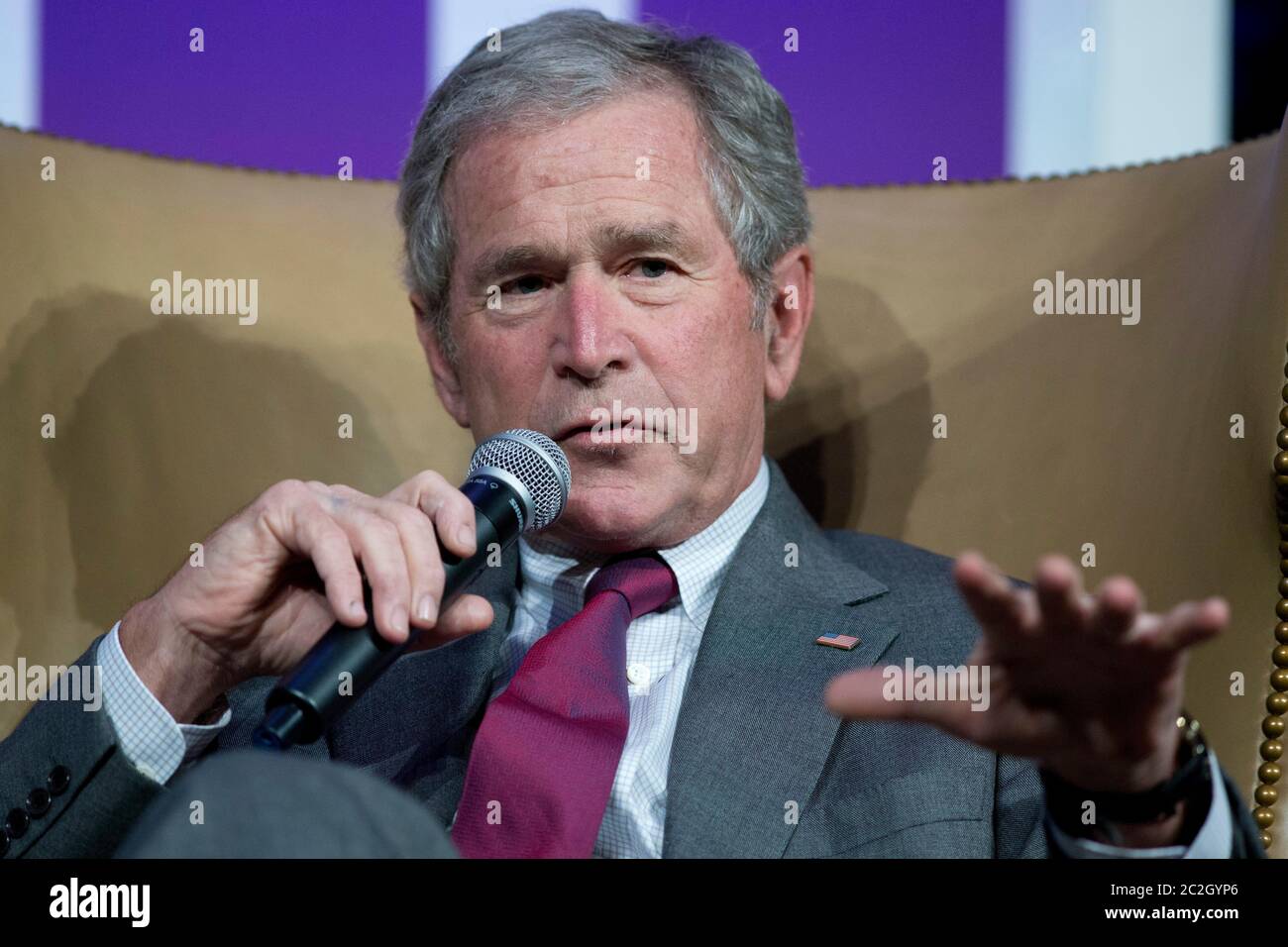 Dallas Texas USA, April 24 2014: Former U.S. President George W. Bush reflects on his challenging eight years in office during a one-hour speech at the Texas Apartment Association's annual convention. Bush is promoting his new book, 'Decision Points.'   ©Bob Daemmrich Stock Photo