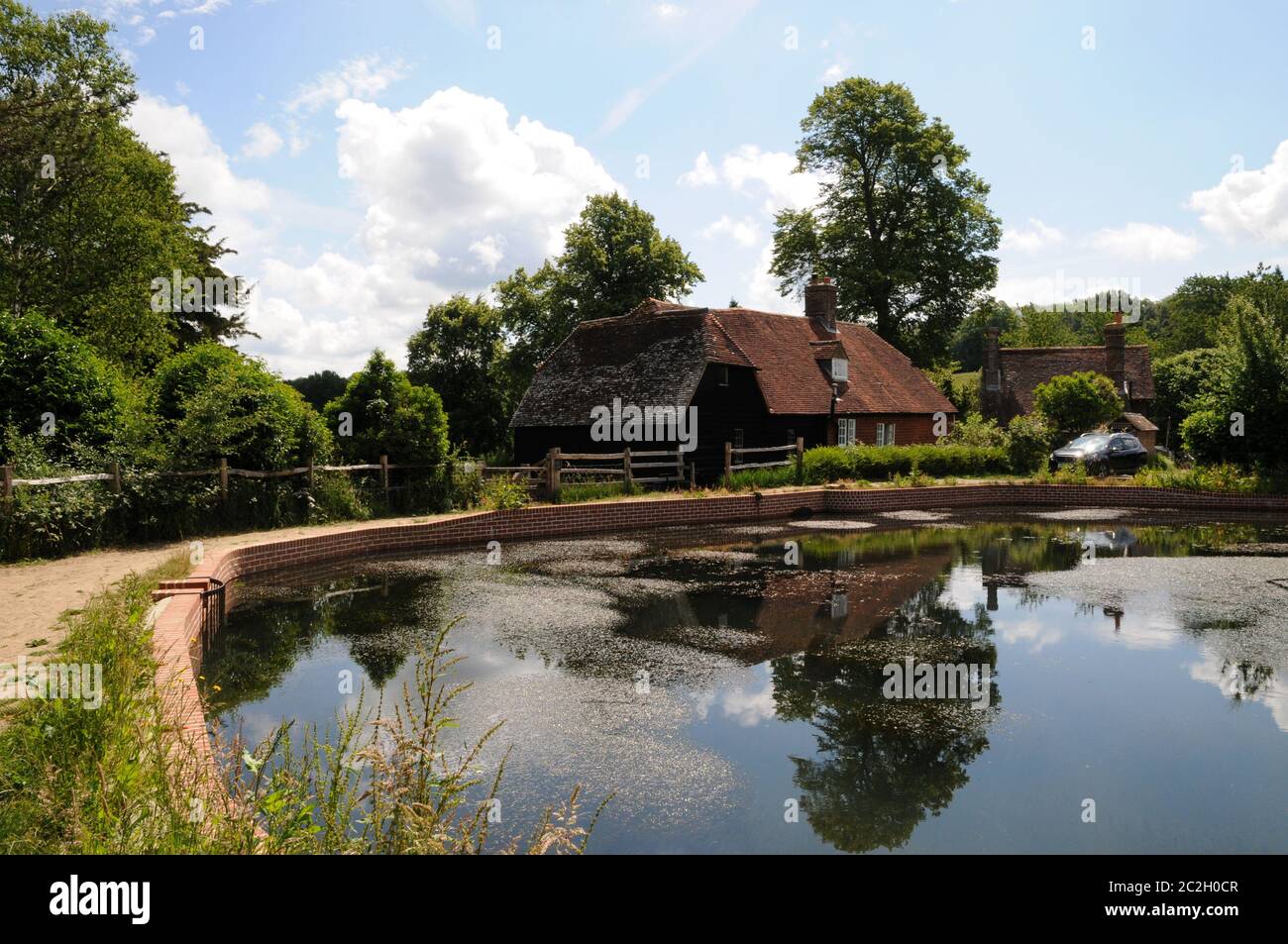 Park Mill at Bateman's, Rudyard Kipling's home from 1902 - 1936. The mill and its pond (seen here) have recently undergone extensive renovations. Stock Photo